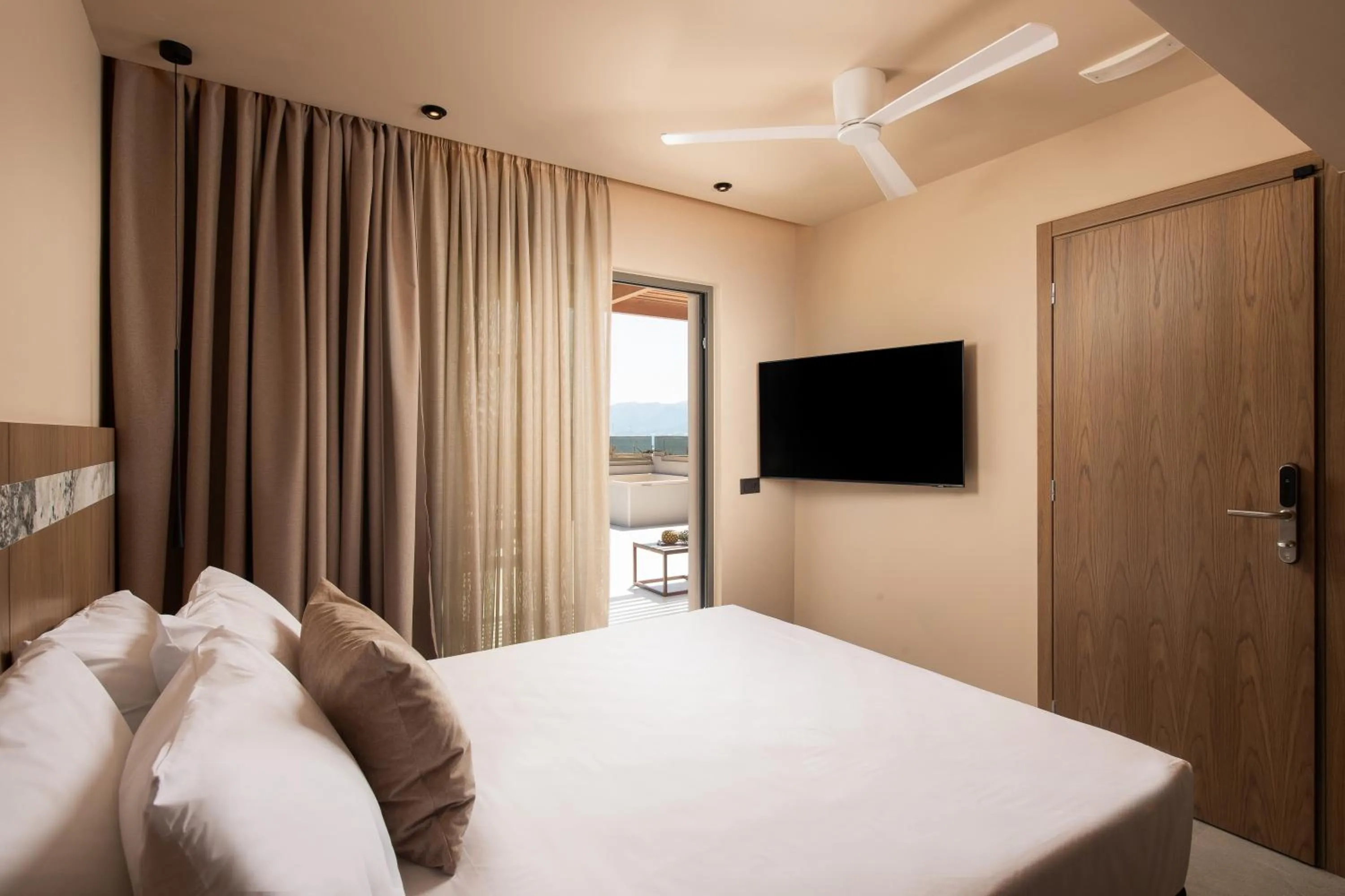 Bed in Cosmeen Lifestyle Boutique Stay