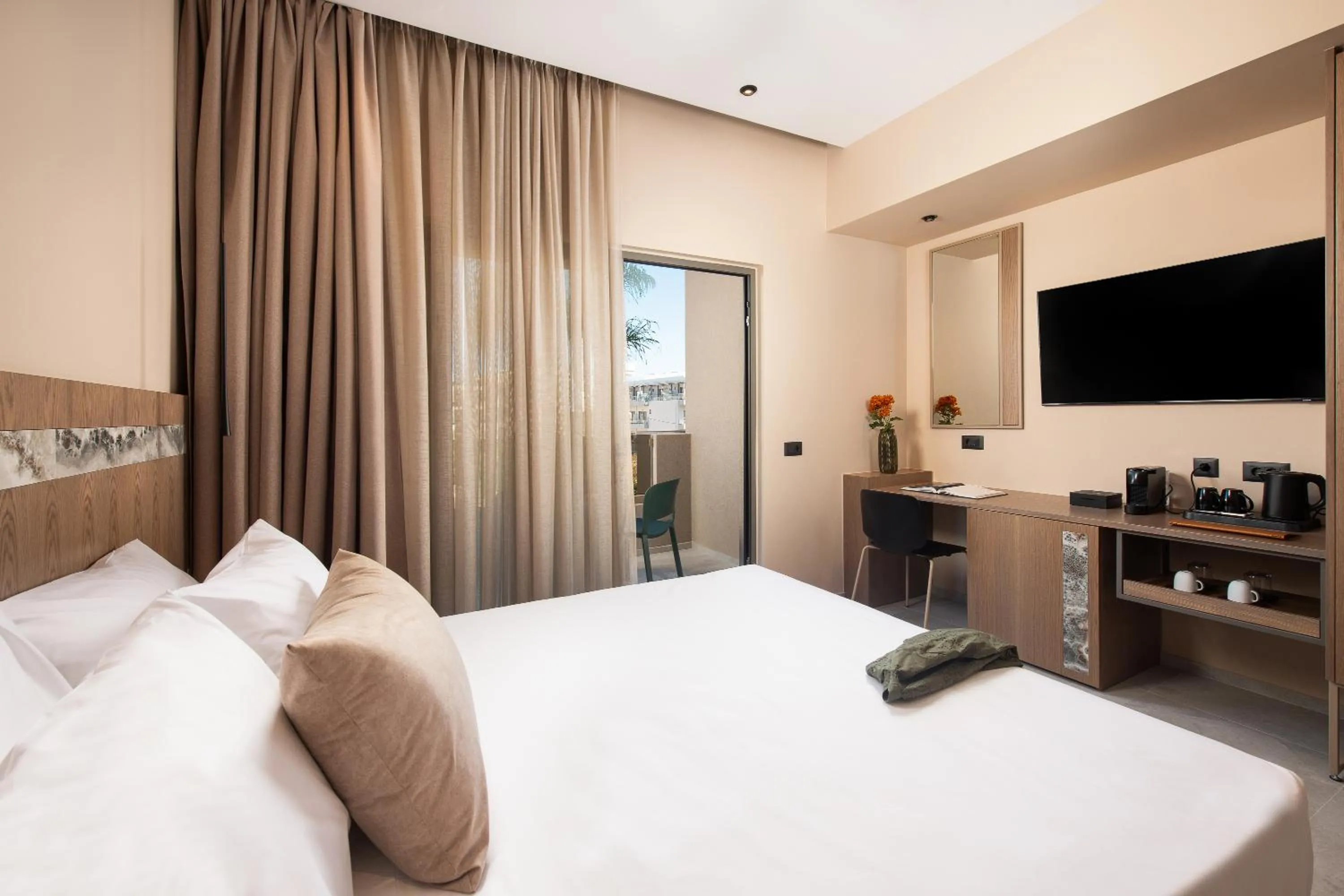 Bed in Cosmeen Lifestyle Boutique Stay