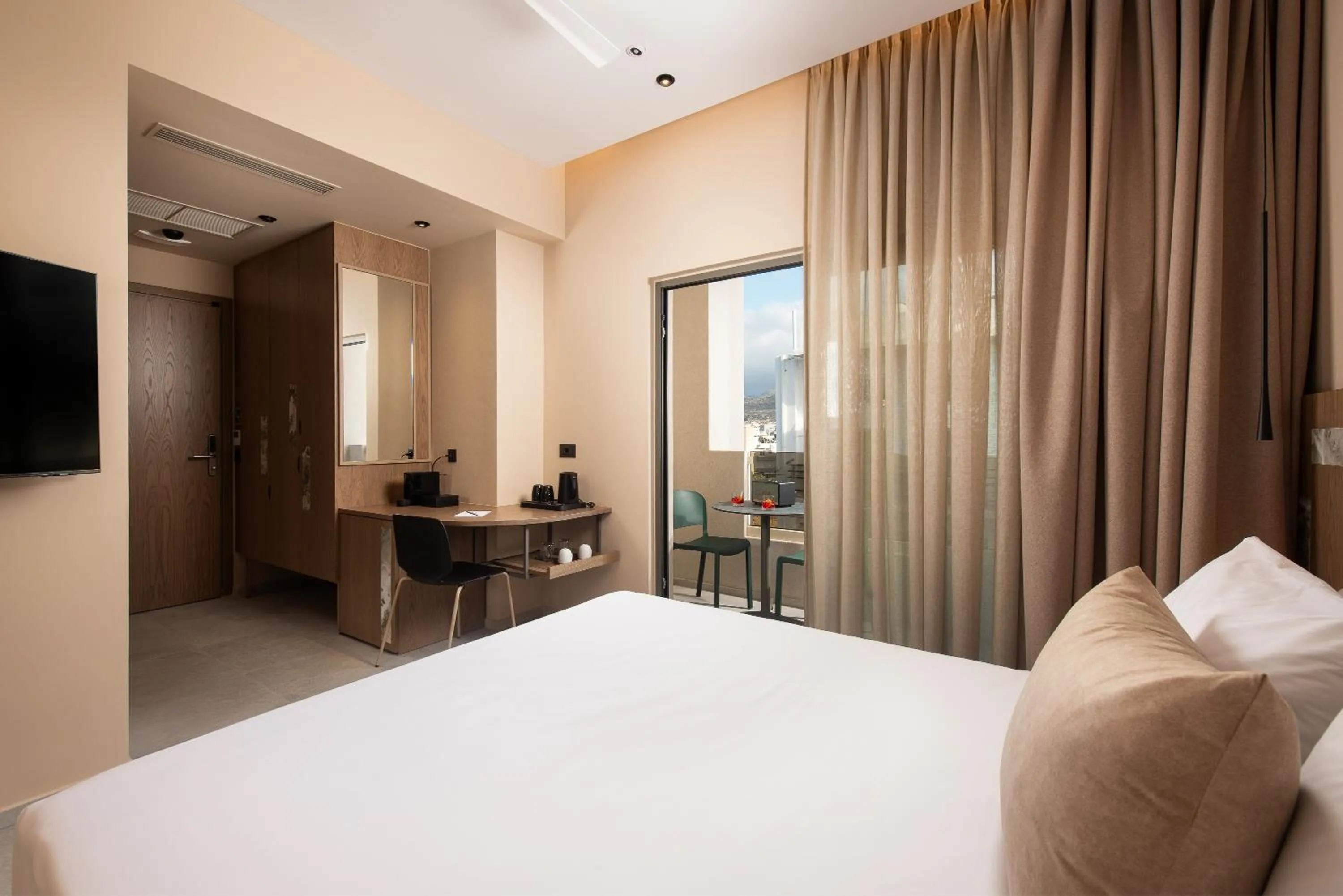 Bed in Cosmeen Lifestyle Boutique Stay