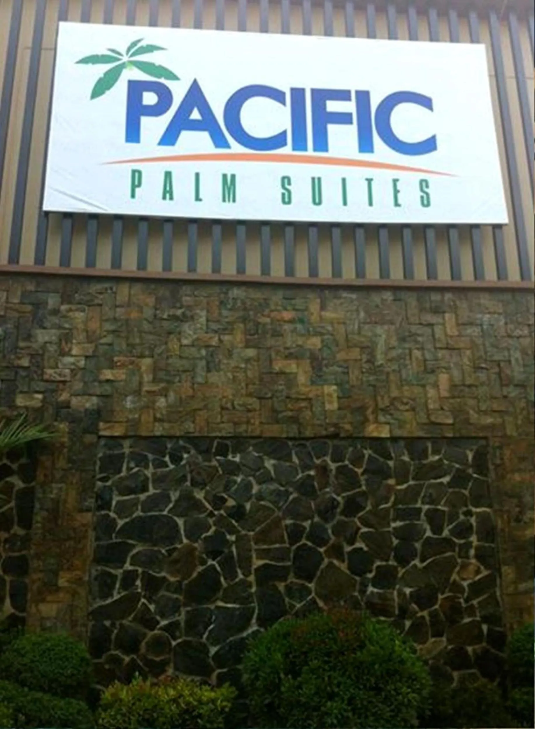 Property logo or sign in Pacific Palm Suites Davao powered by Cocotel