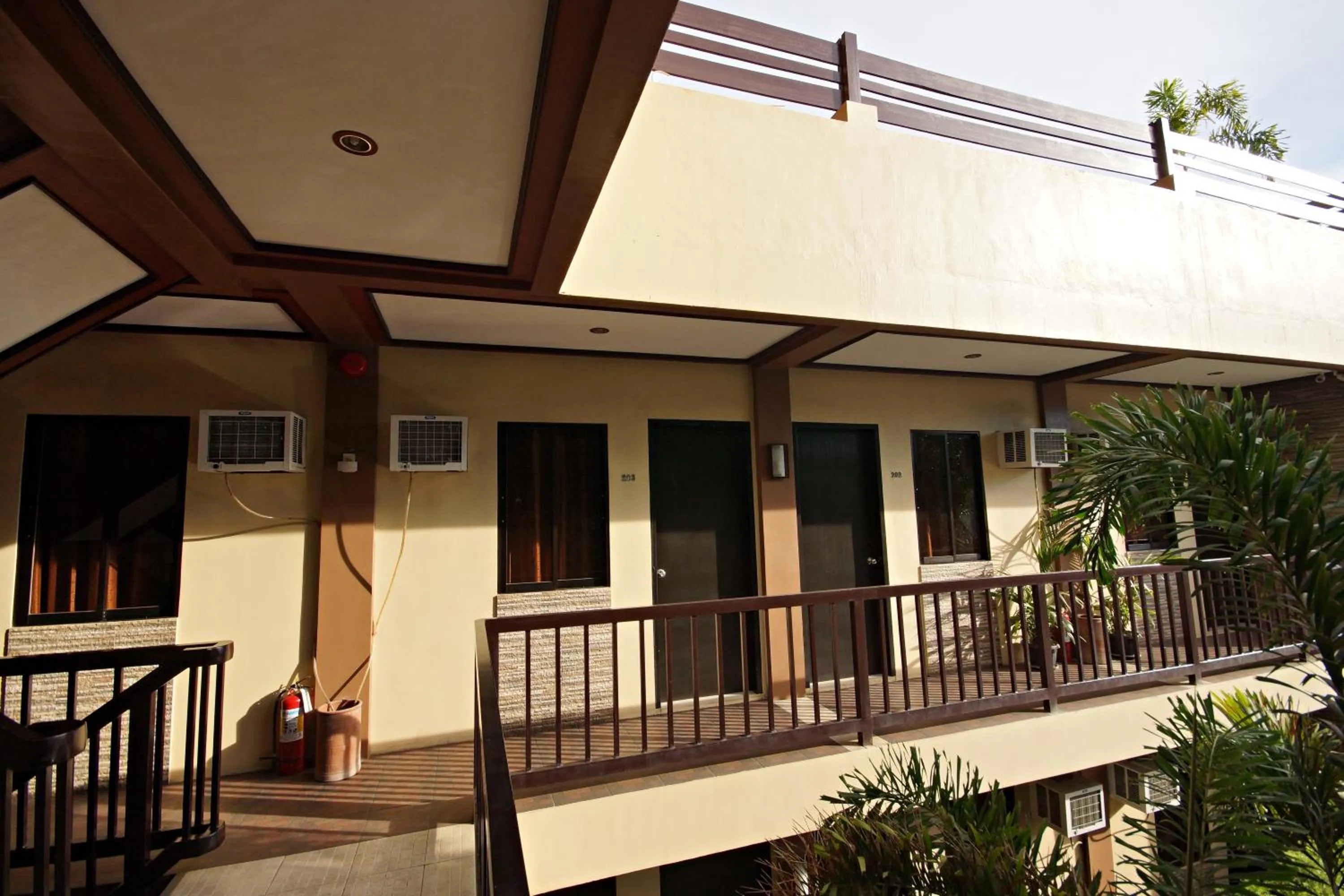 Facade/entrance in Pacific Palm Suites Davao powered by Cocotel