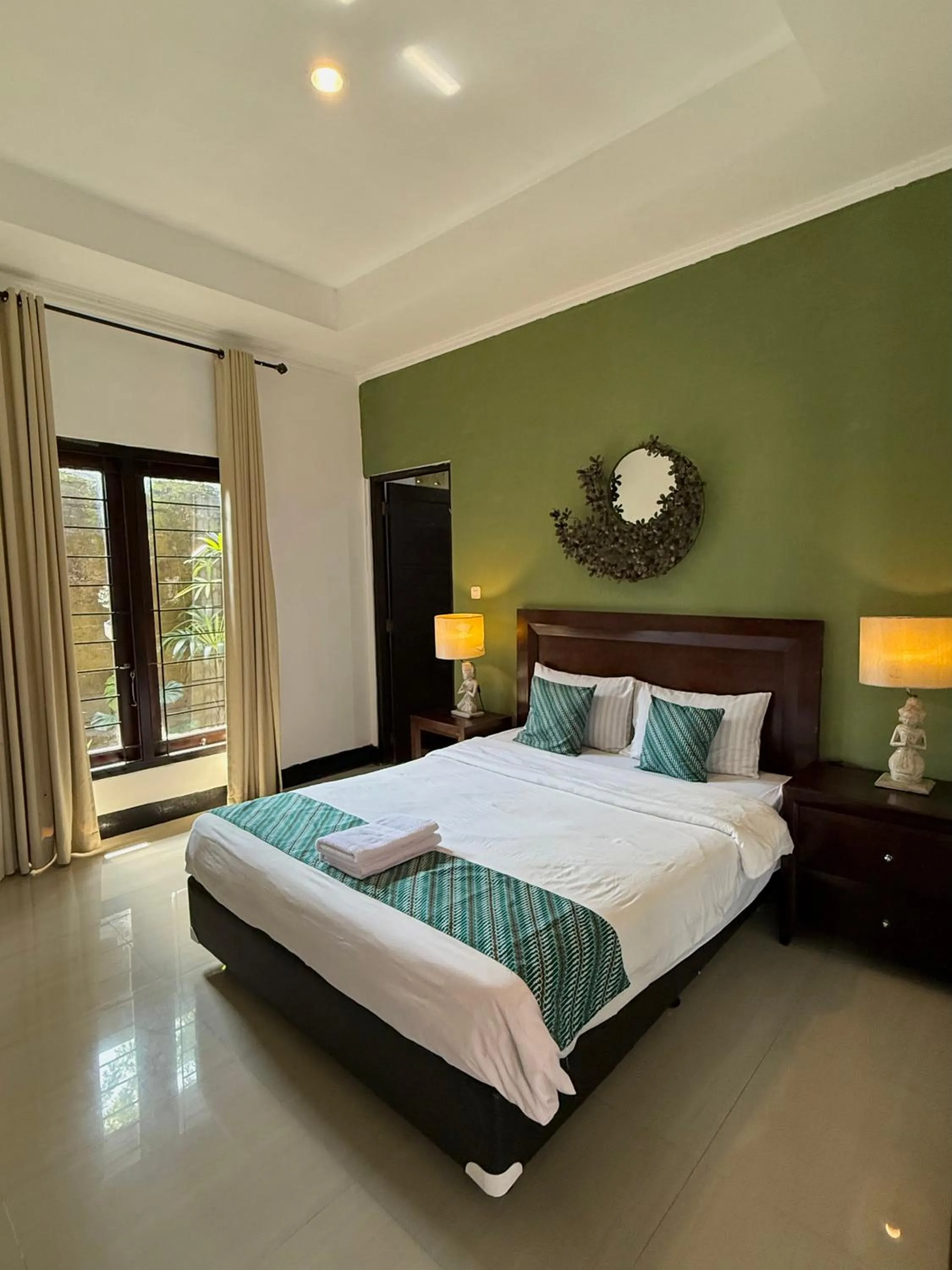 Bed in Villa Padi Cangkringan
