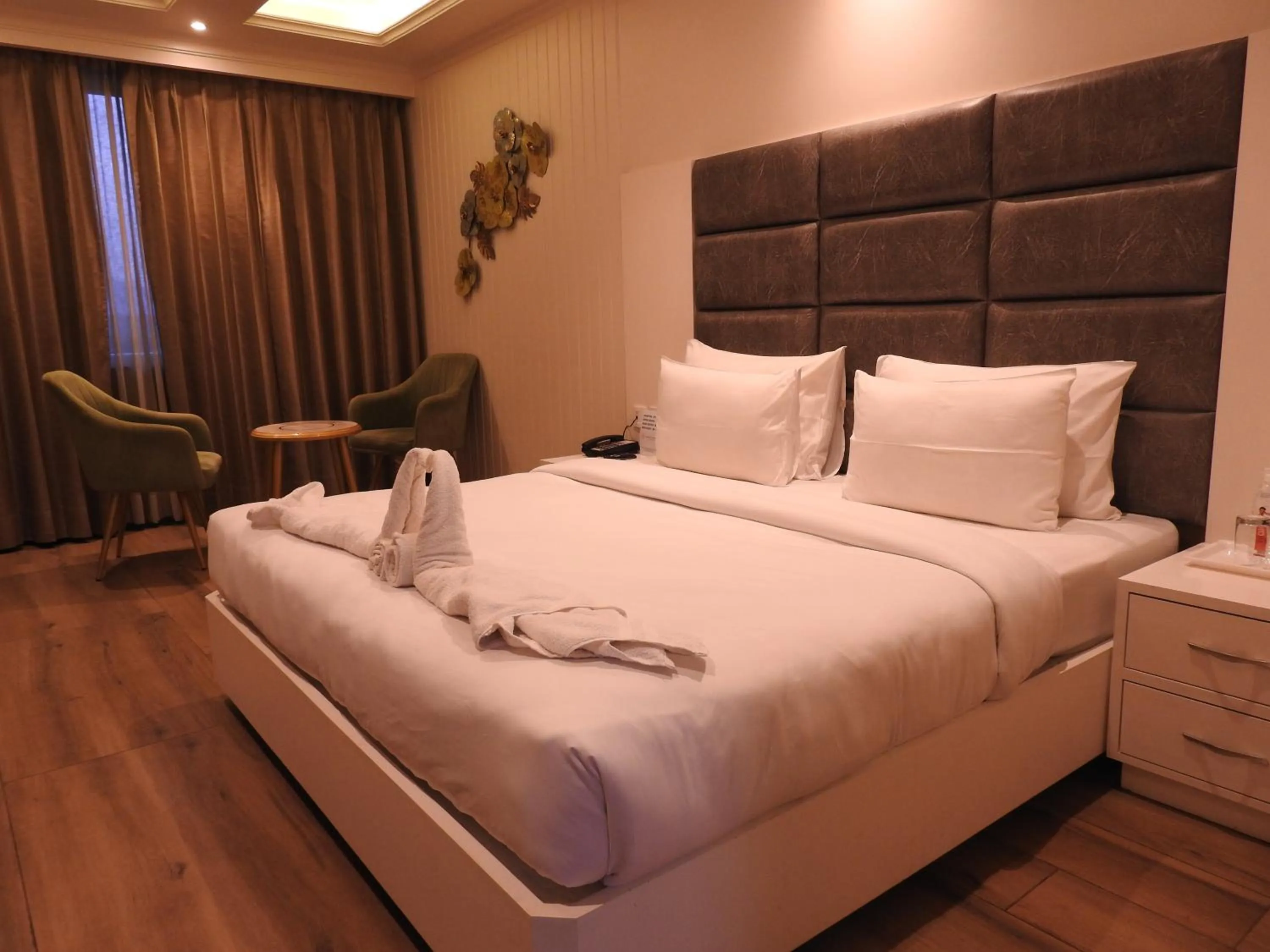 Bed in Sapphire Sky Hotel