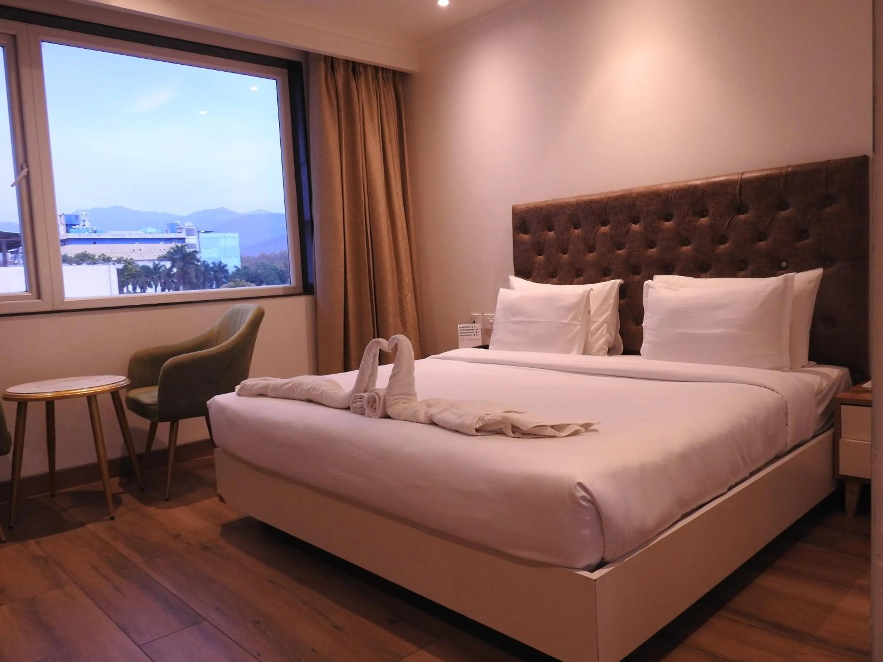 Bed in Sapphire Sky Hotel