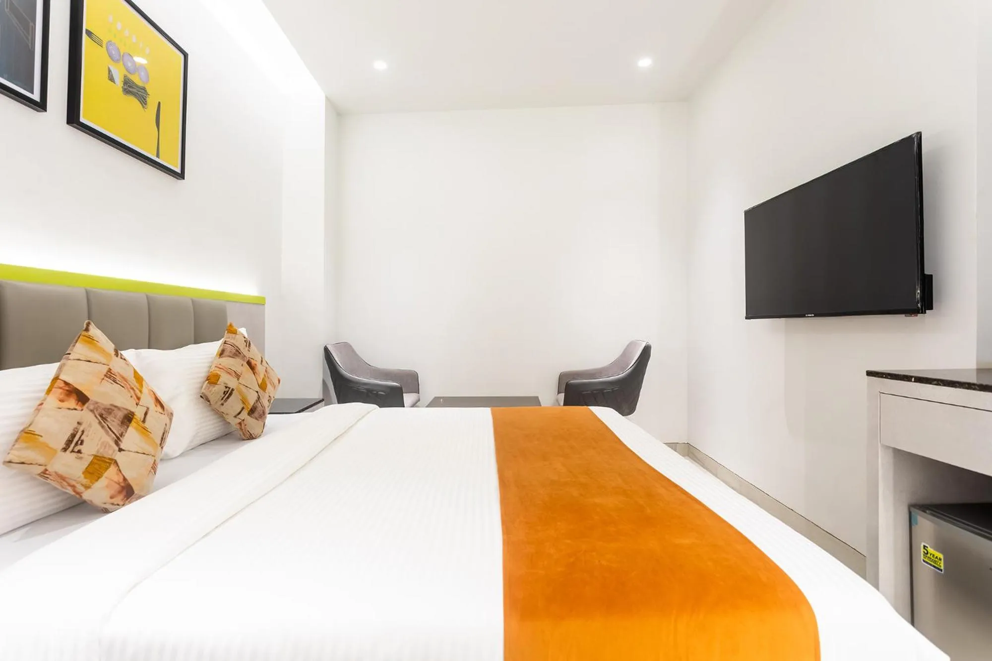 Bed in FabHotel Orange Oasis