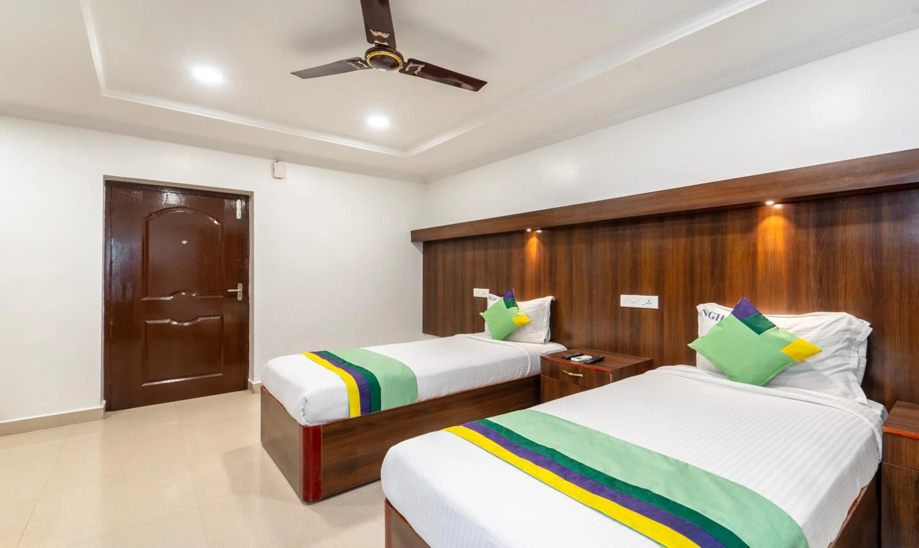 Bed in Treebo NGH Transit