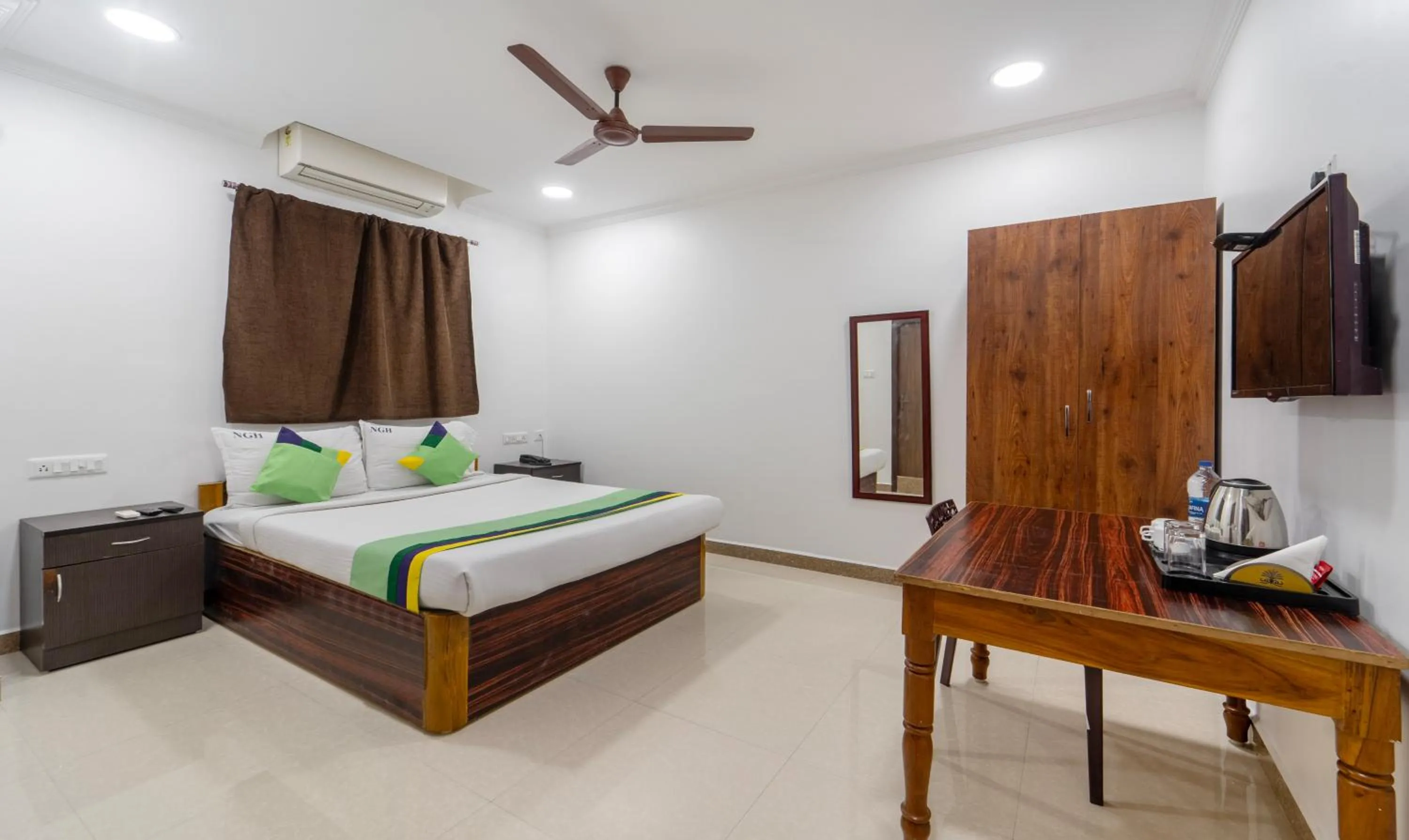 Bed in Treebo NGH Transit