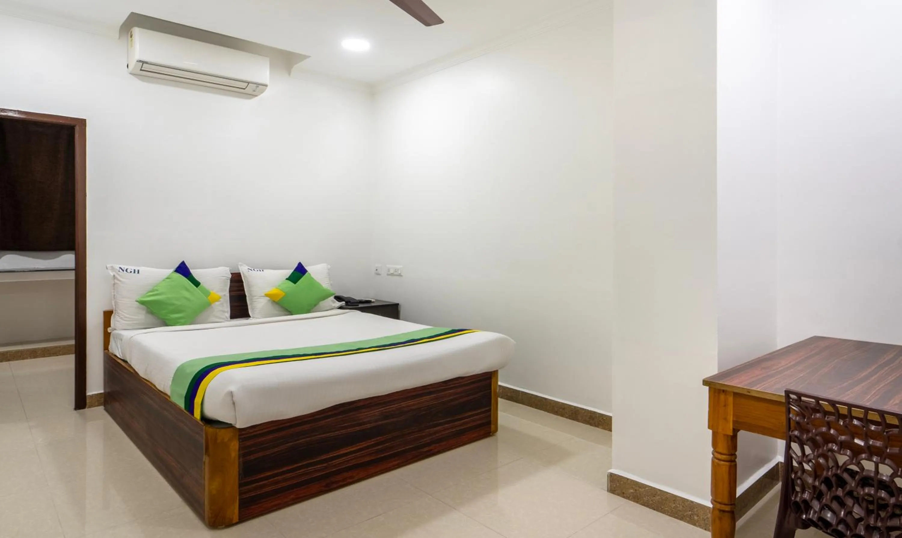 Bed in Treebo NGH Transit