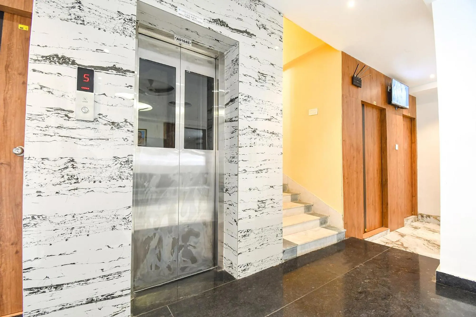 elevator in FabHotel Prime The Golden Plaza - Nr Tarapith Temple