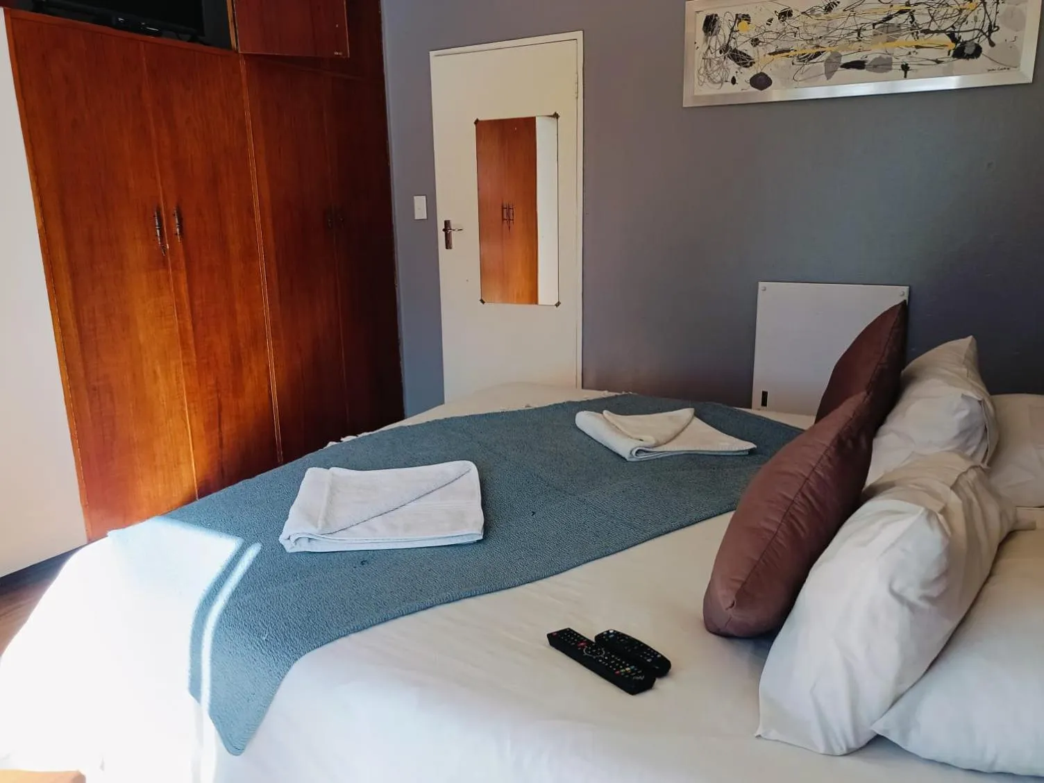 Photo of the whole room, Bed in 21 On Coetzee Guest House