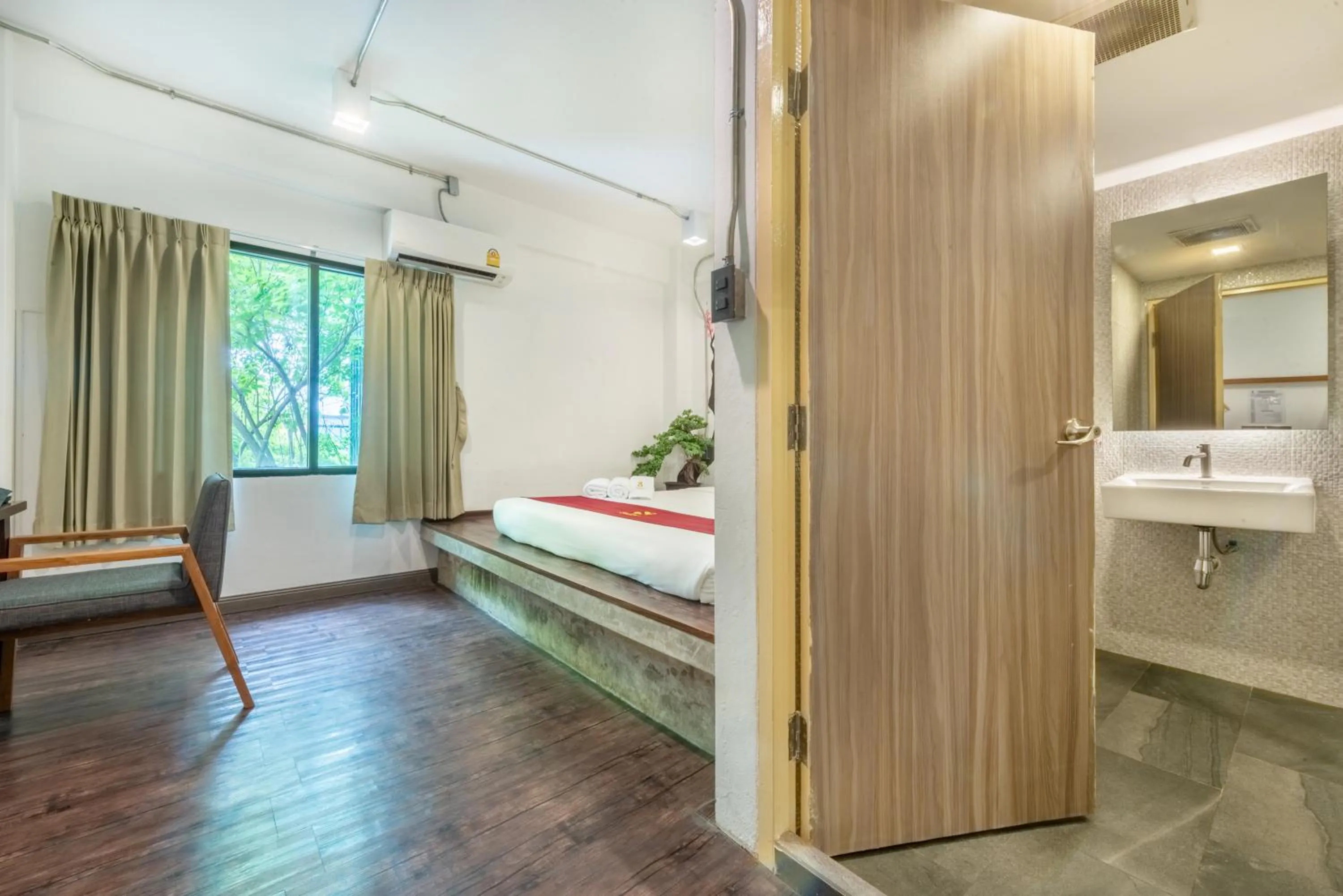 Photo of the whole room, Bed in SHIN Hotel Nimman ChiangMai