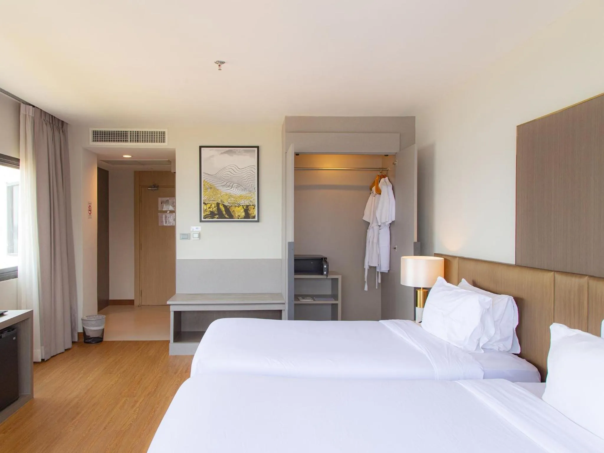 Photo of the whole room, Bed in Fortune River View Hotel Nakhon Phanom