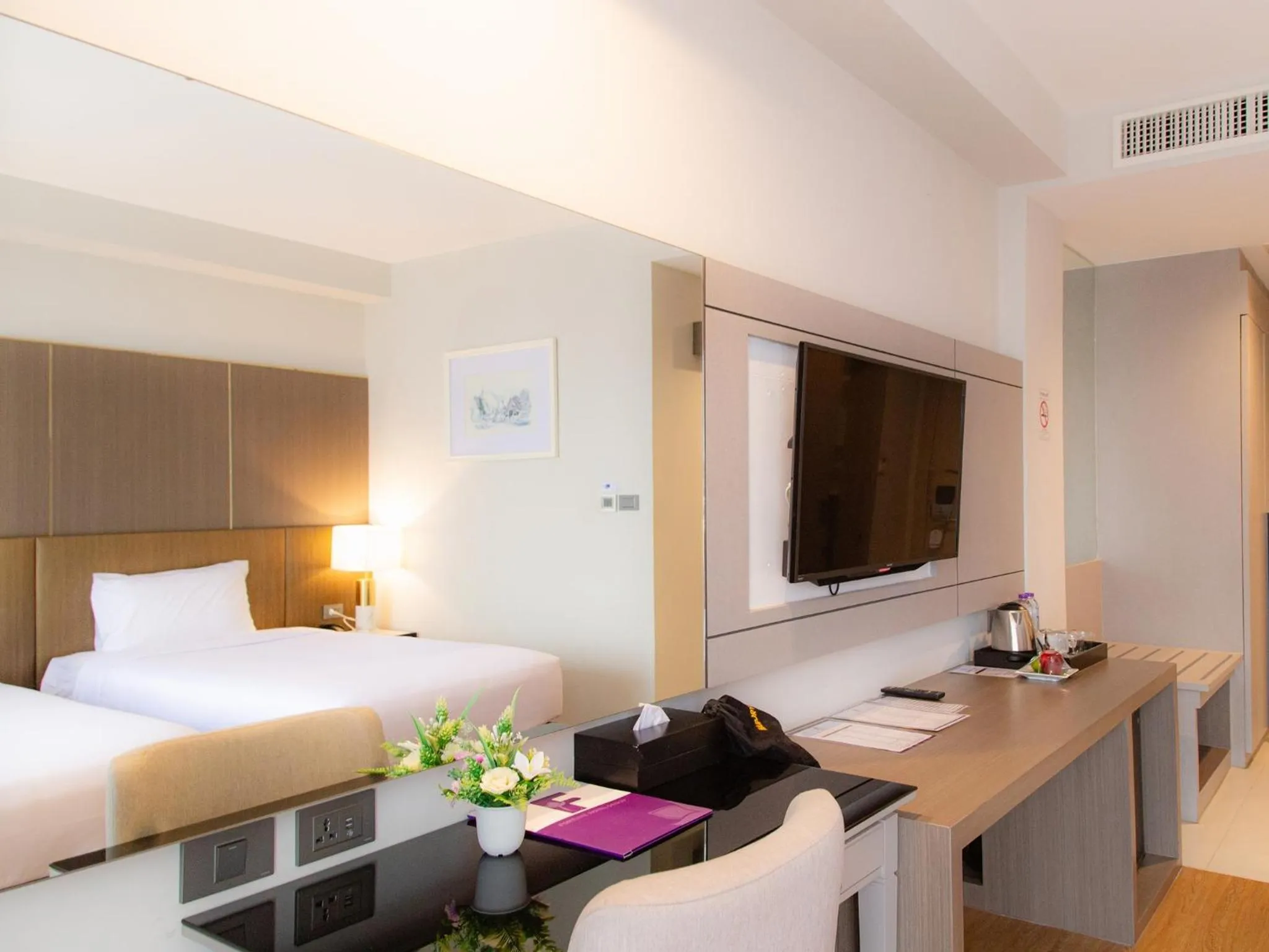 Bed in Fortune River View Hotel Nakhon Phanom