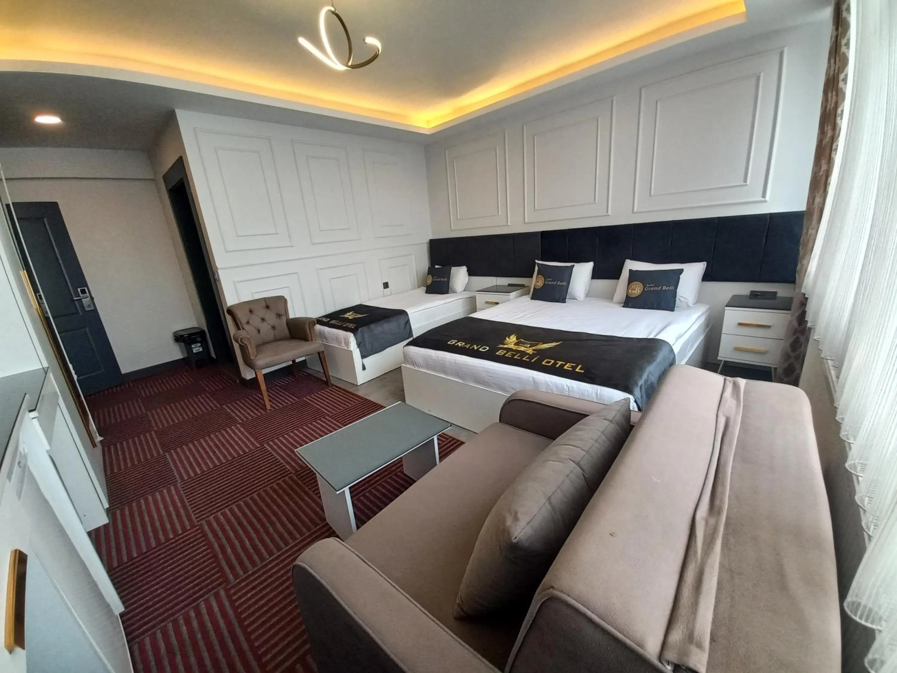 Bed in GRAND BELLİ OTEL