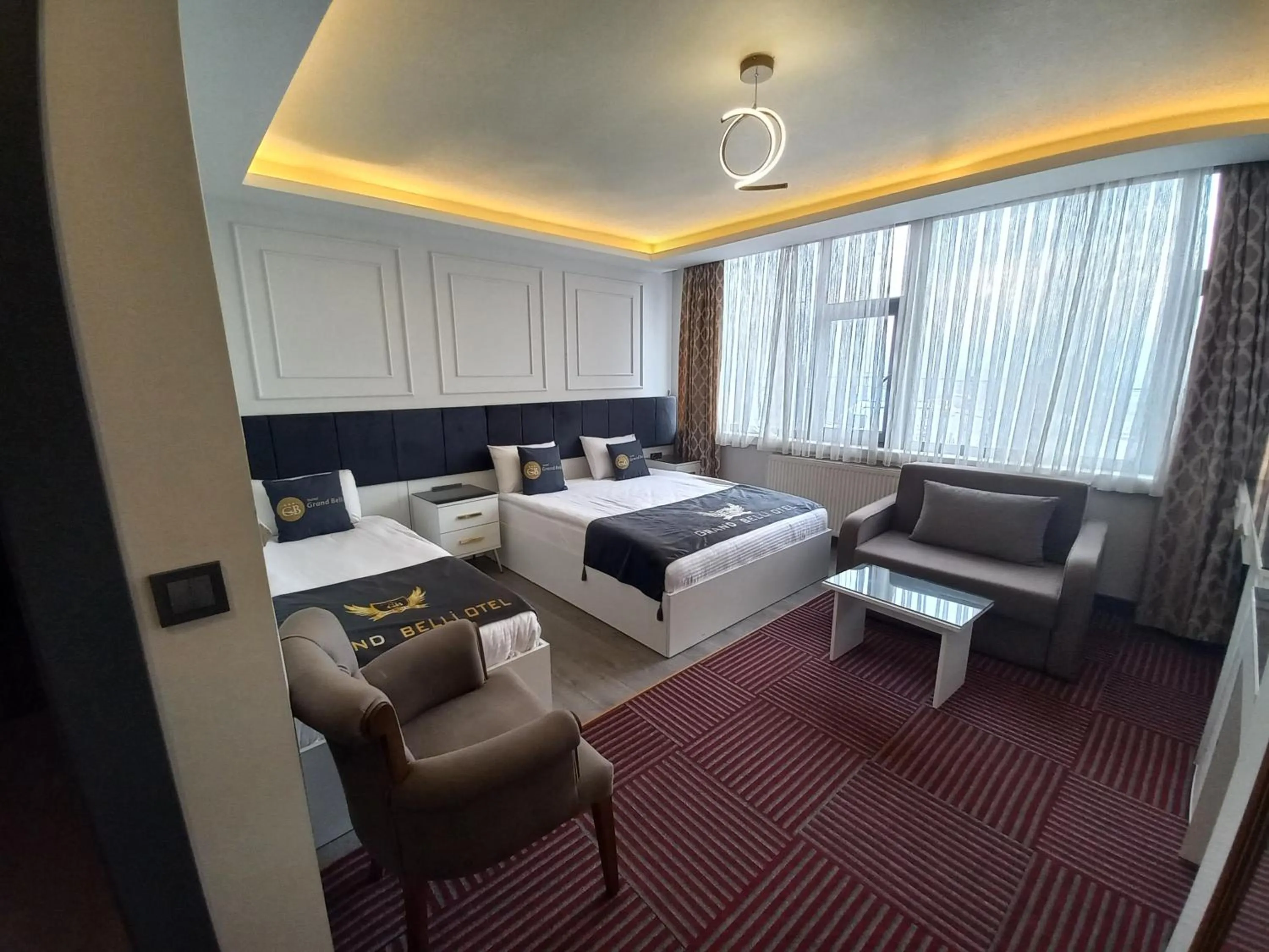 Bed in GRAND BELLİ OTEL