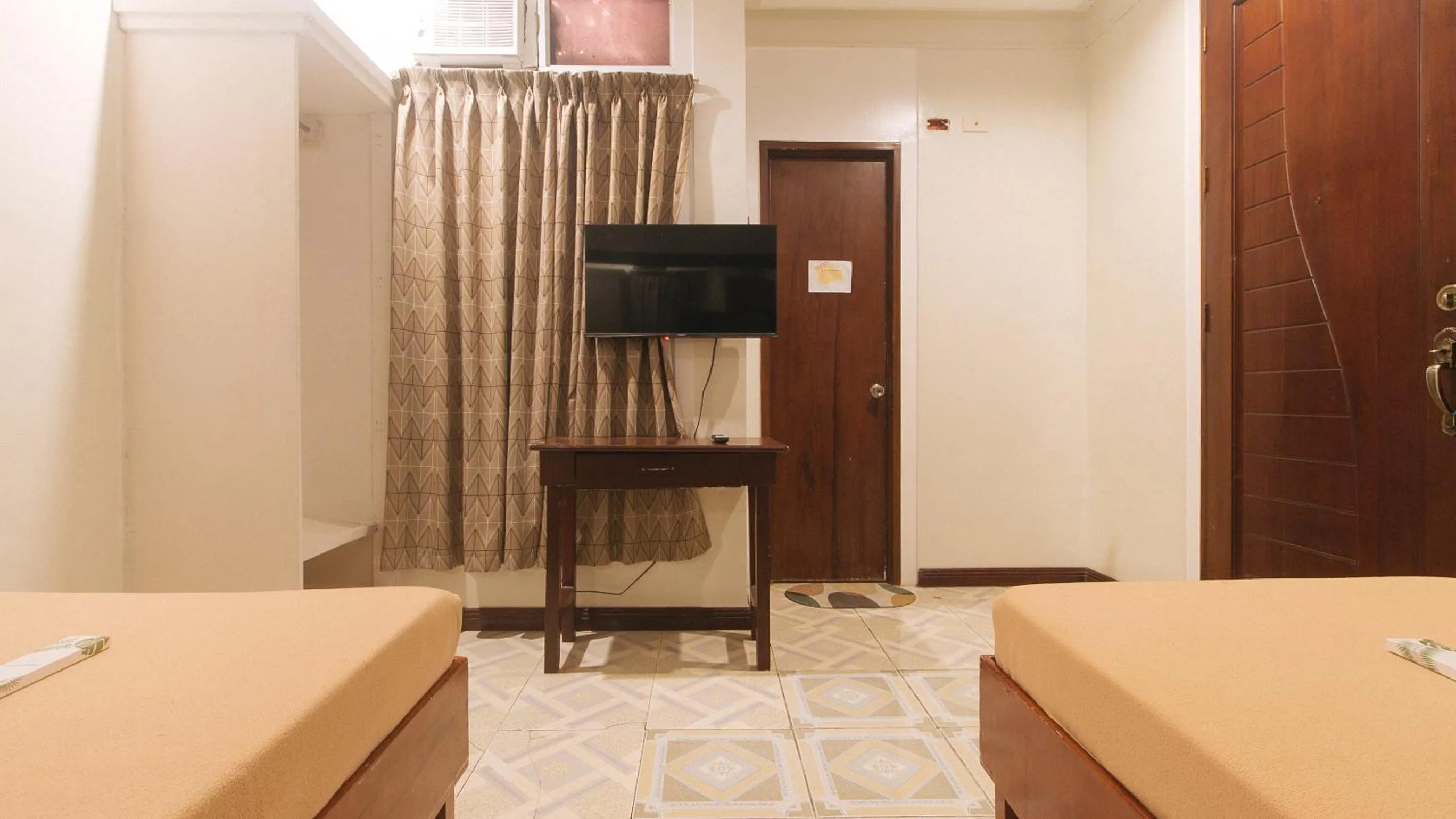 TV and multimedia in Buenas J Hotel and Spa