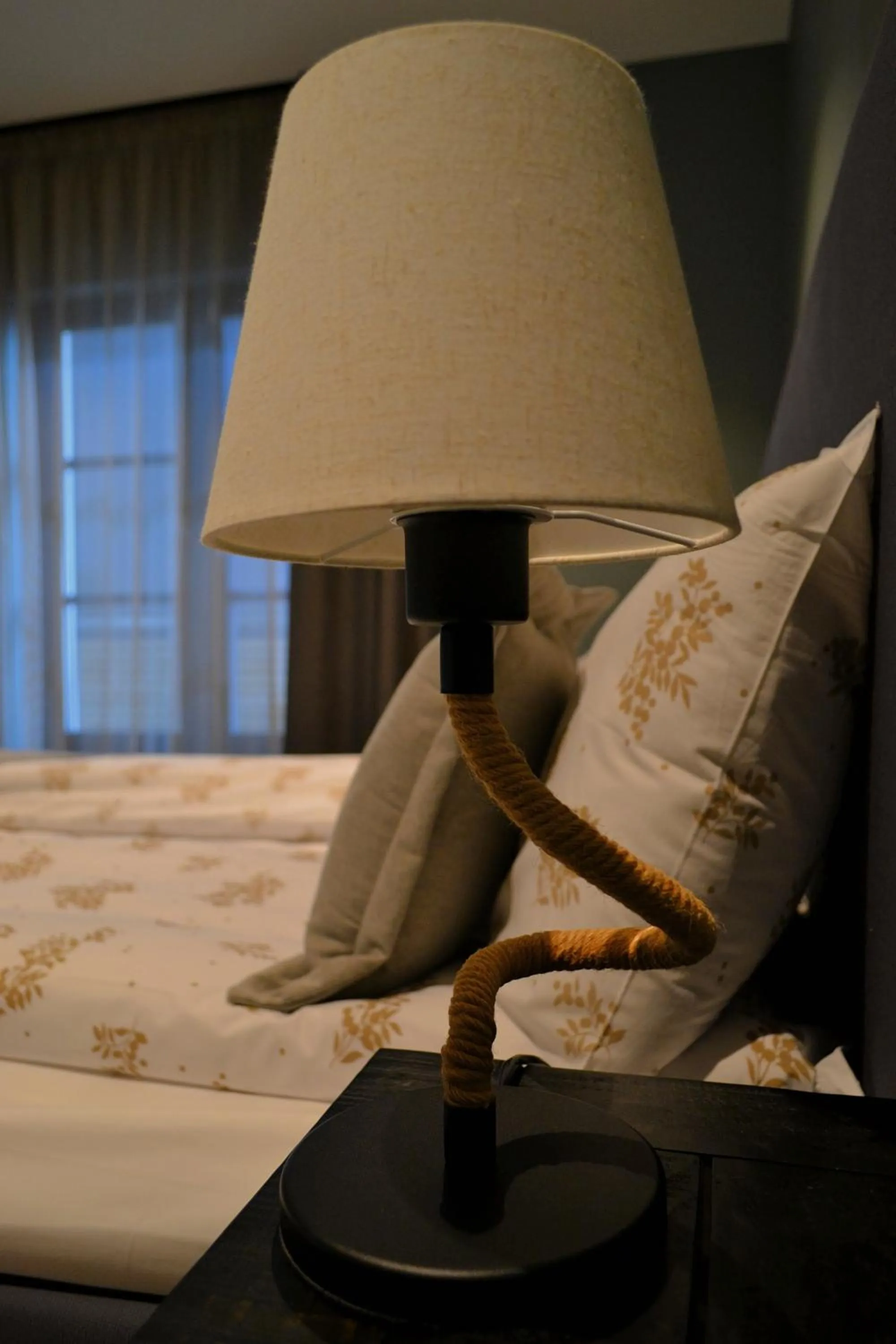 Bed in Andenes Suitehotel