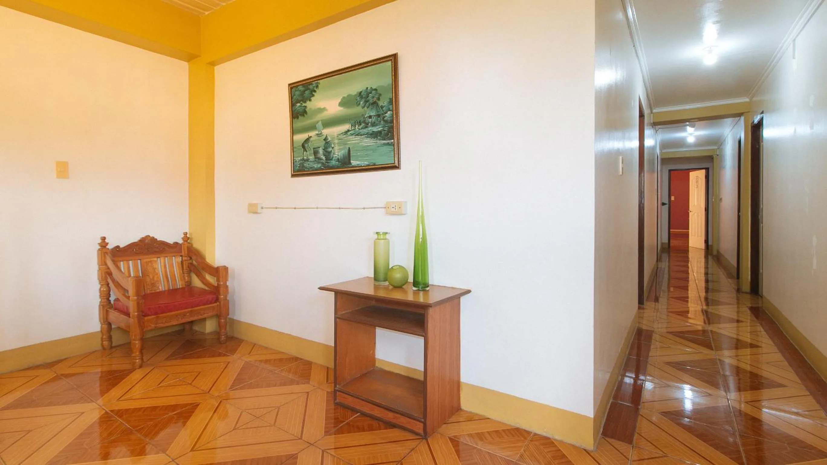 Seating area in RedDoorz @ Farm Side Hotel Laoag City