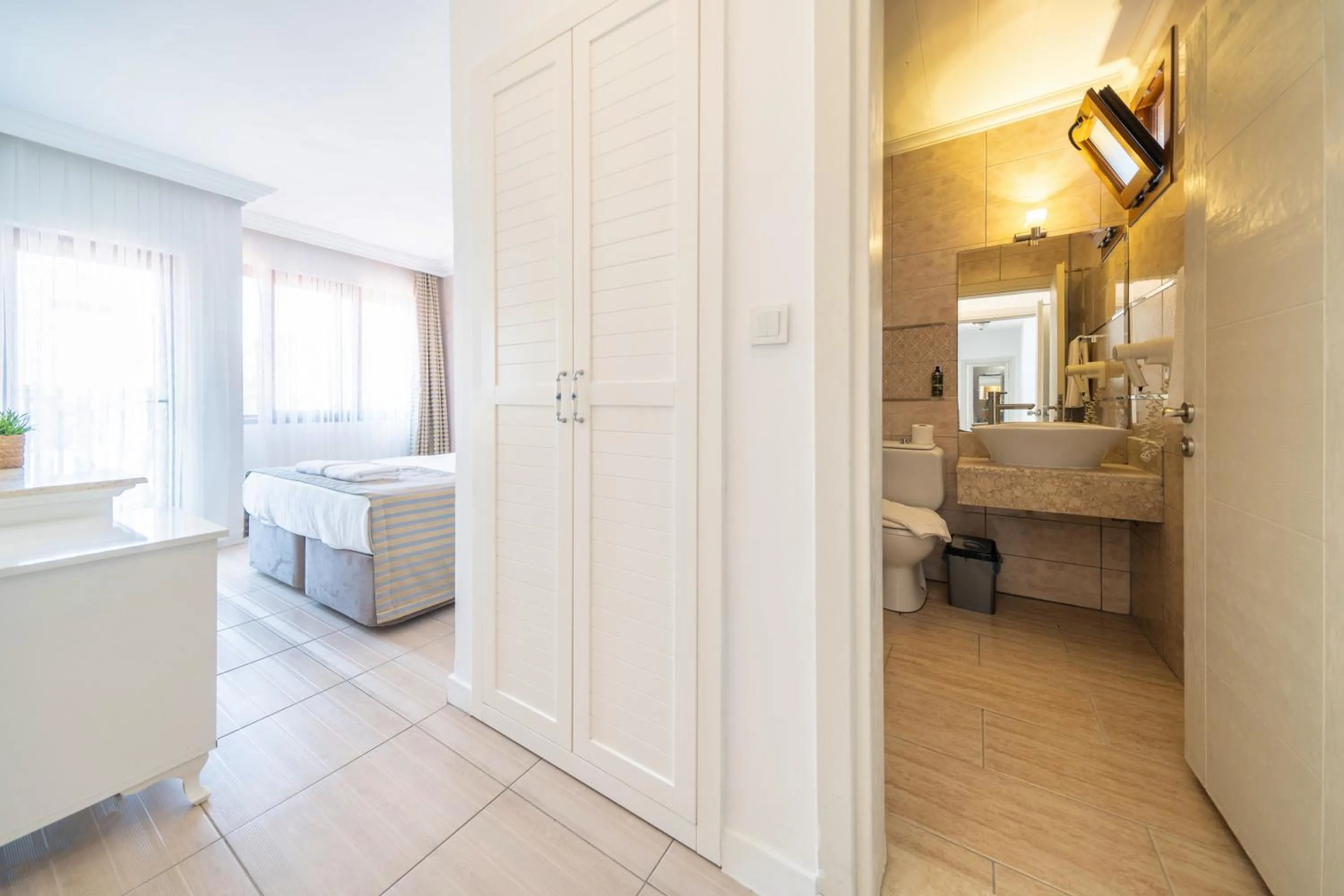 Photo of the whole room, Bed in Ata Lagoon Beach Hotel