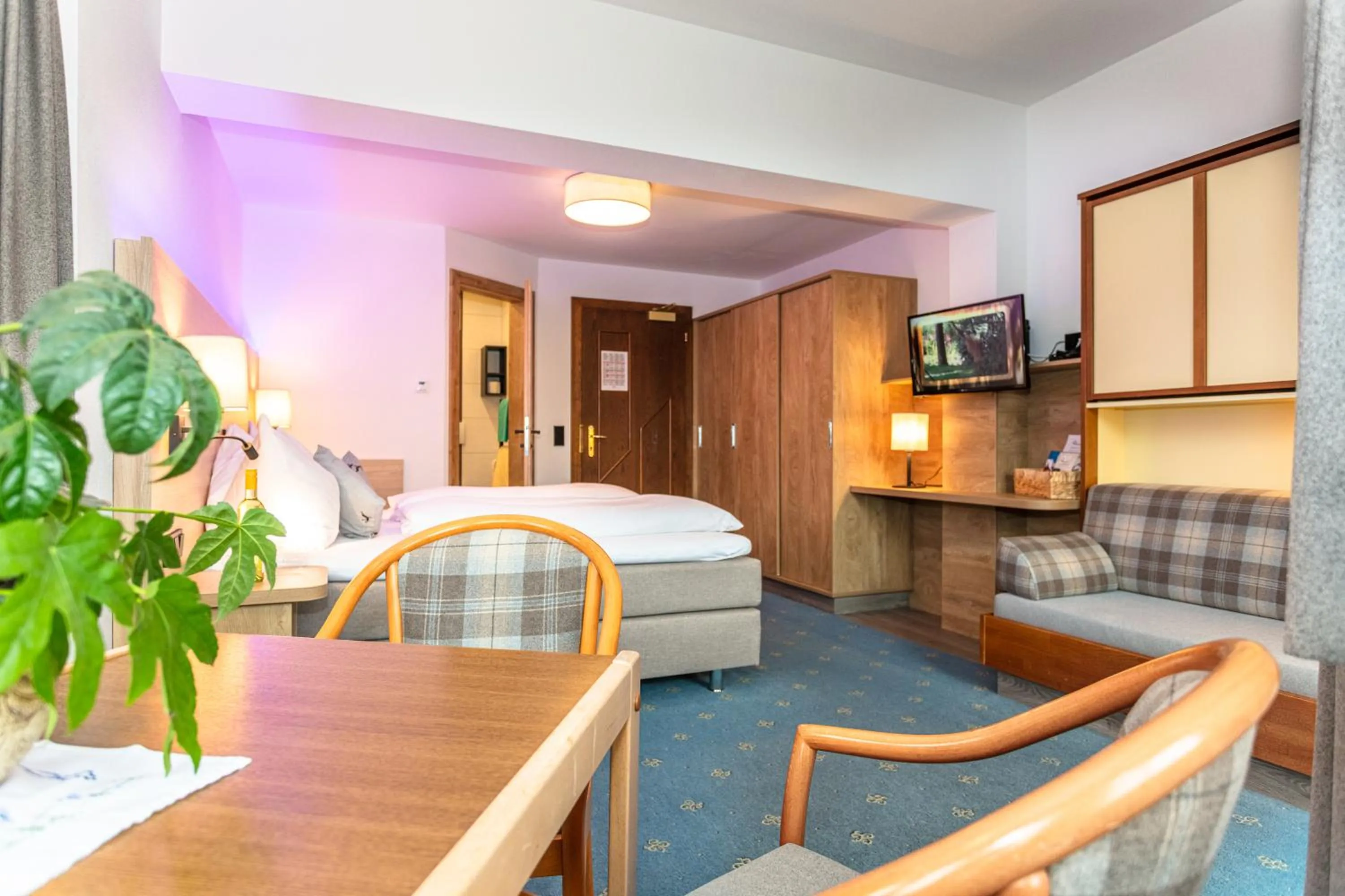 Seating area, Bed in Landgasthof Neuwirt