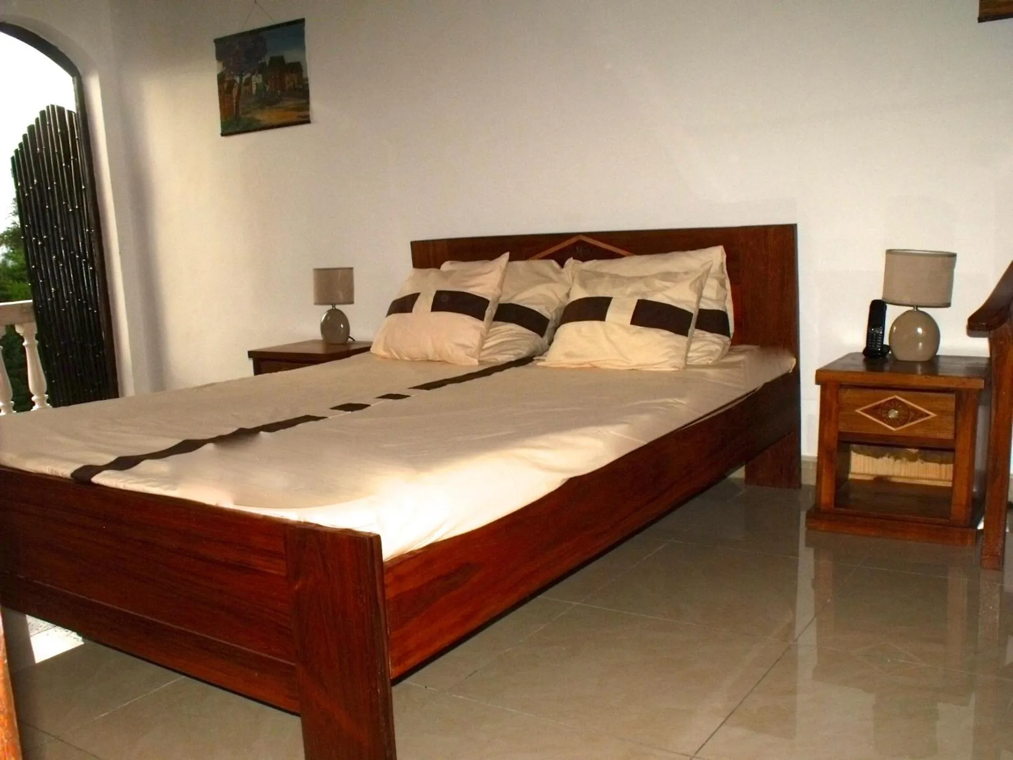 Photo of the whole room, Bed in Iarimbato Hotel