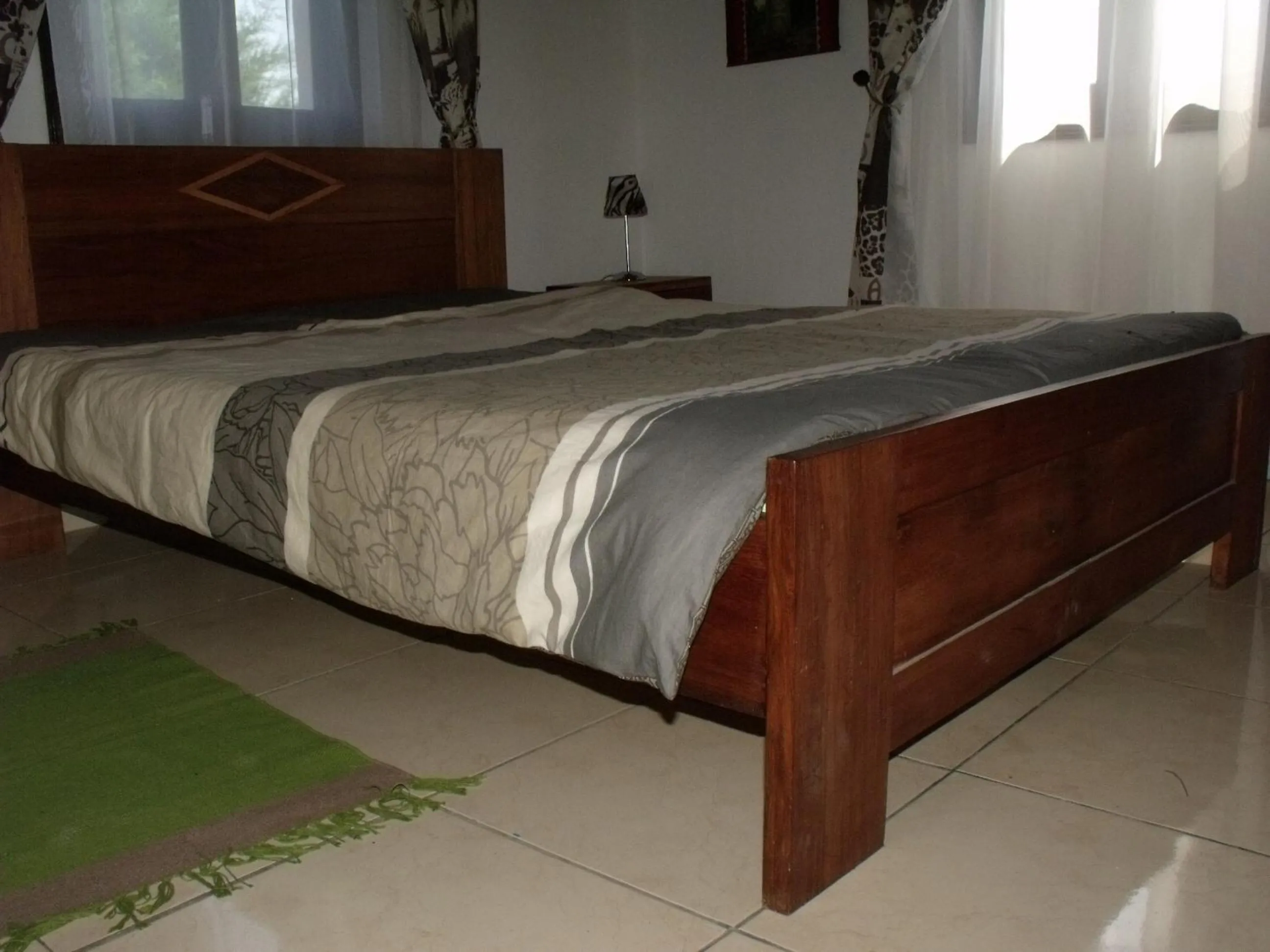 Photo of the whole room, Bed in Iarimbato Hotel