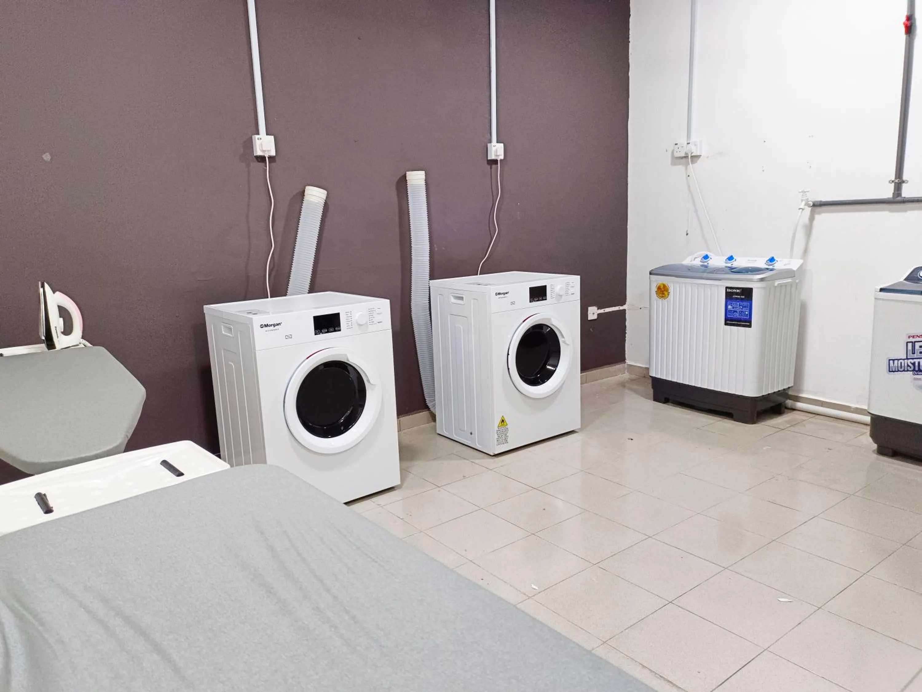 washing machine in Salaam Suites Hotel