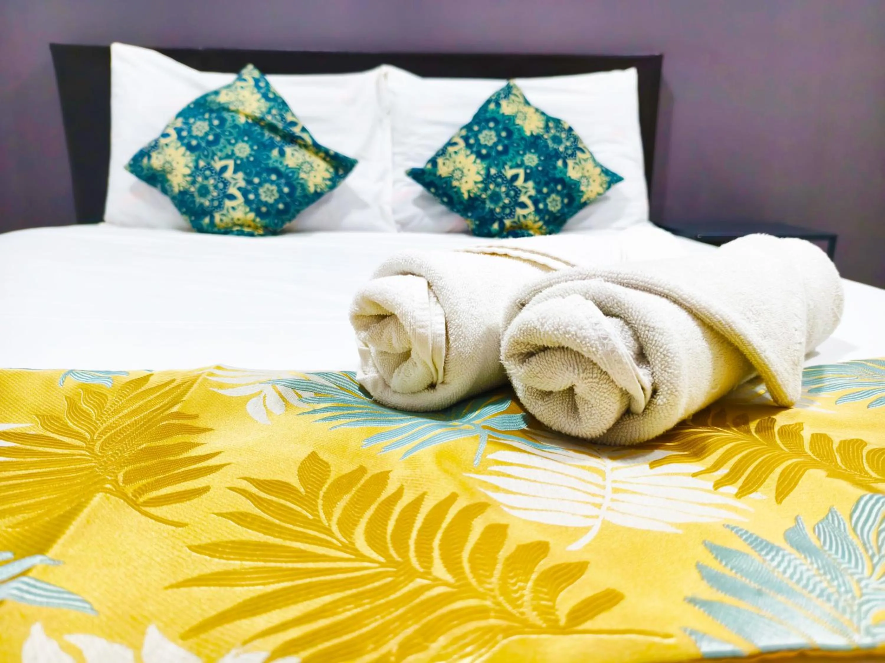 Bed in Salaam Suites Hotel