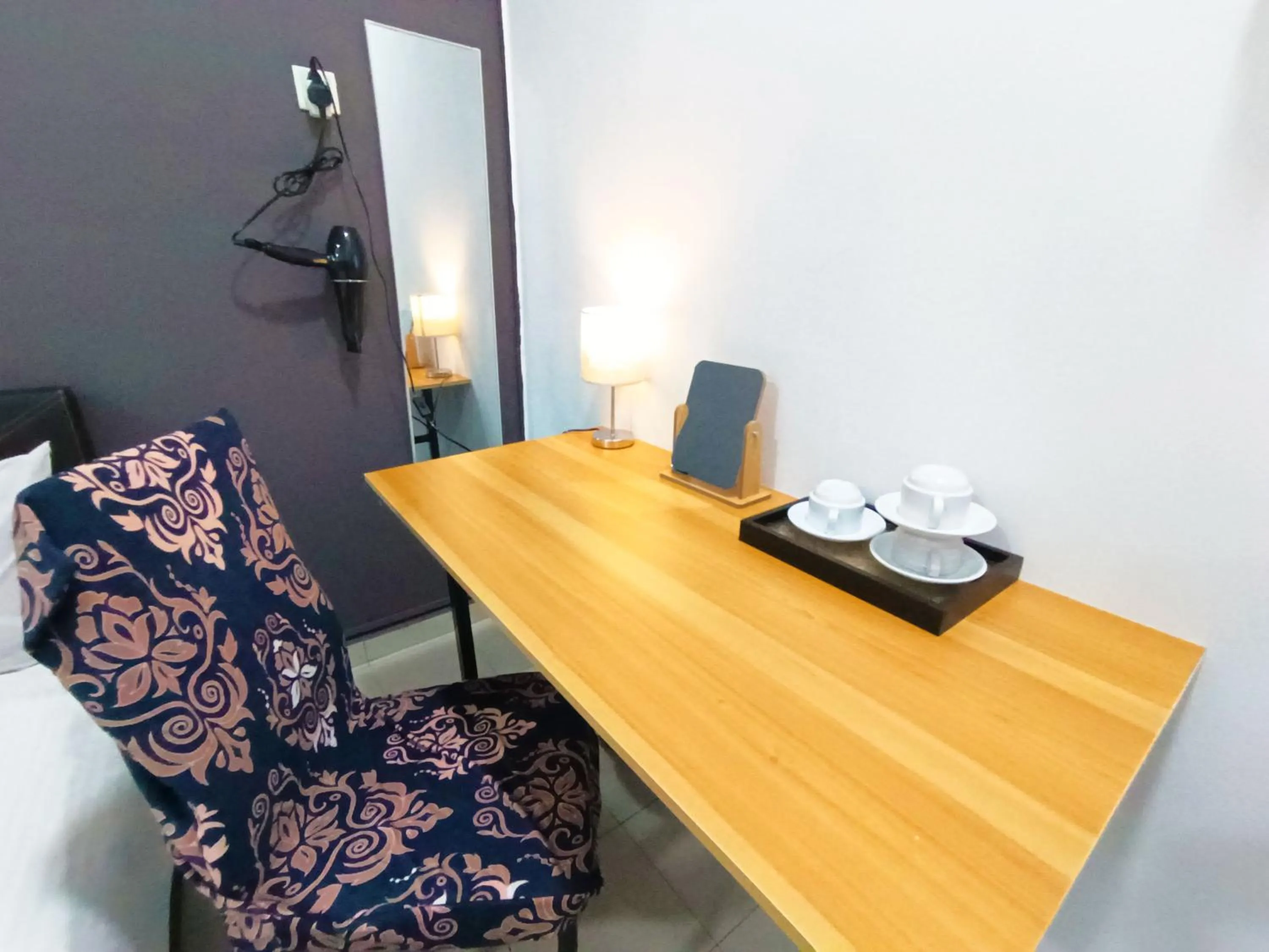 Bed in Salaam Suites Hotel