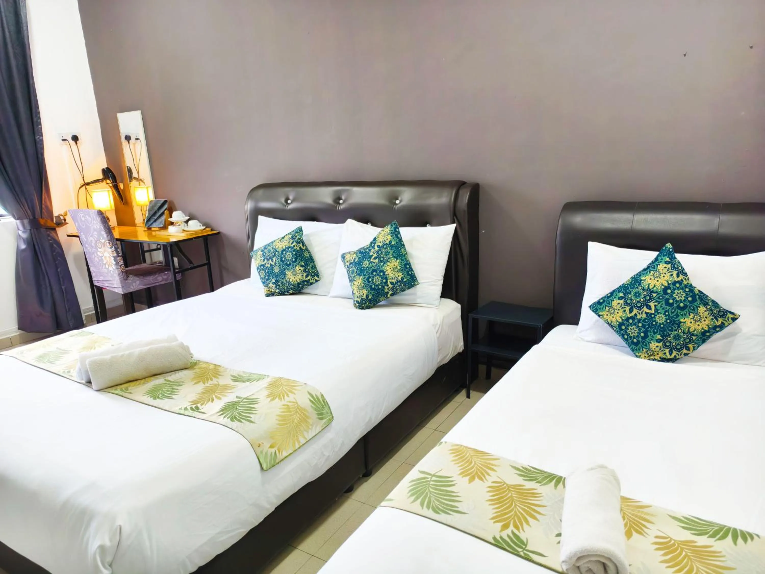 Bed in Salaam Suites Hotel