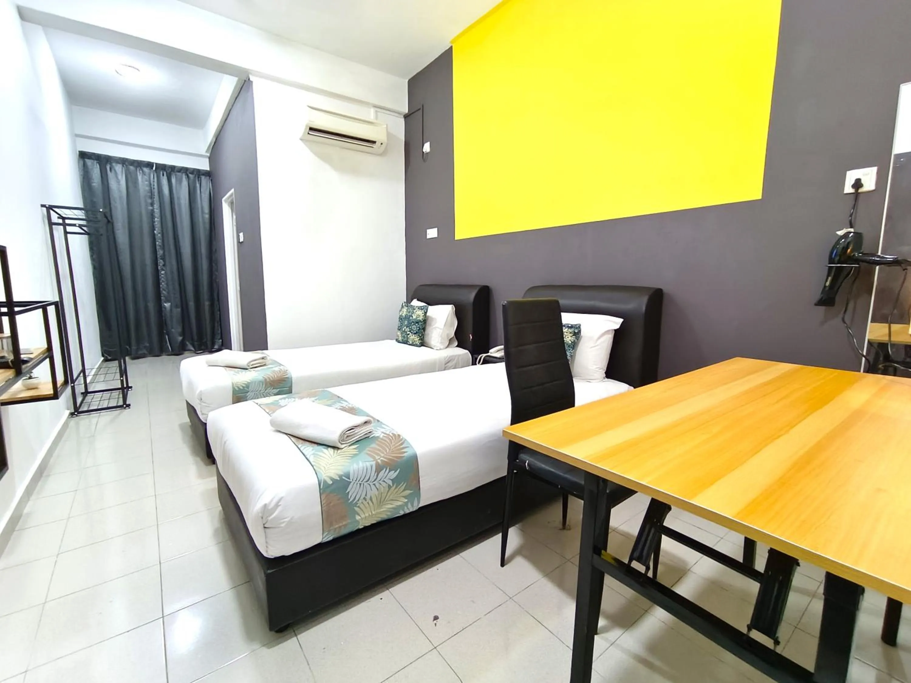 Bed in Salaam Suites Hotel