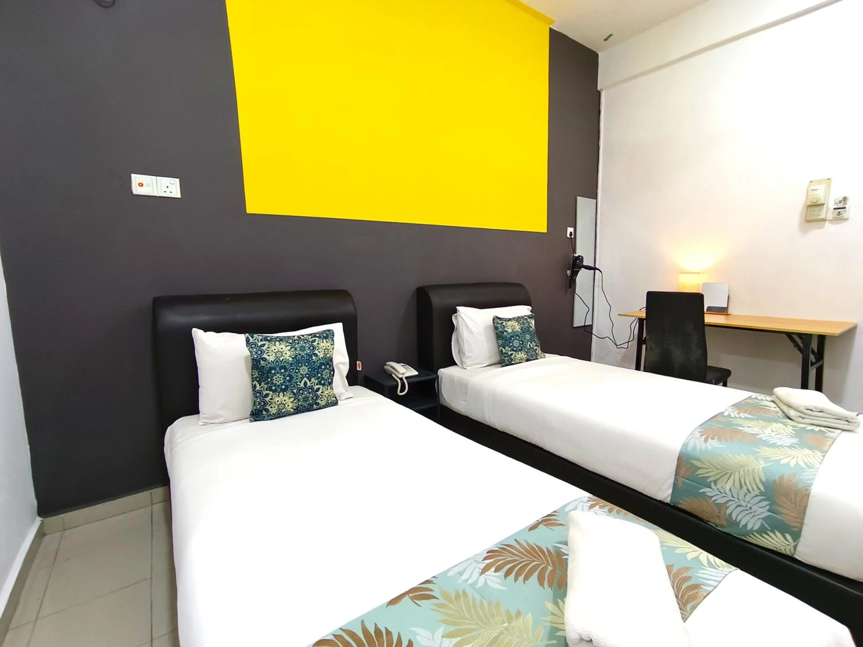 Bed in Salaam Suites Hotel