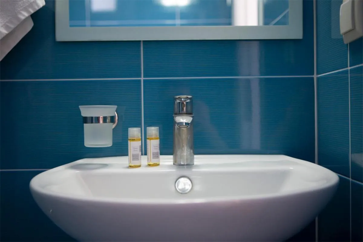 Bathroom in Menes Hotel