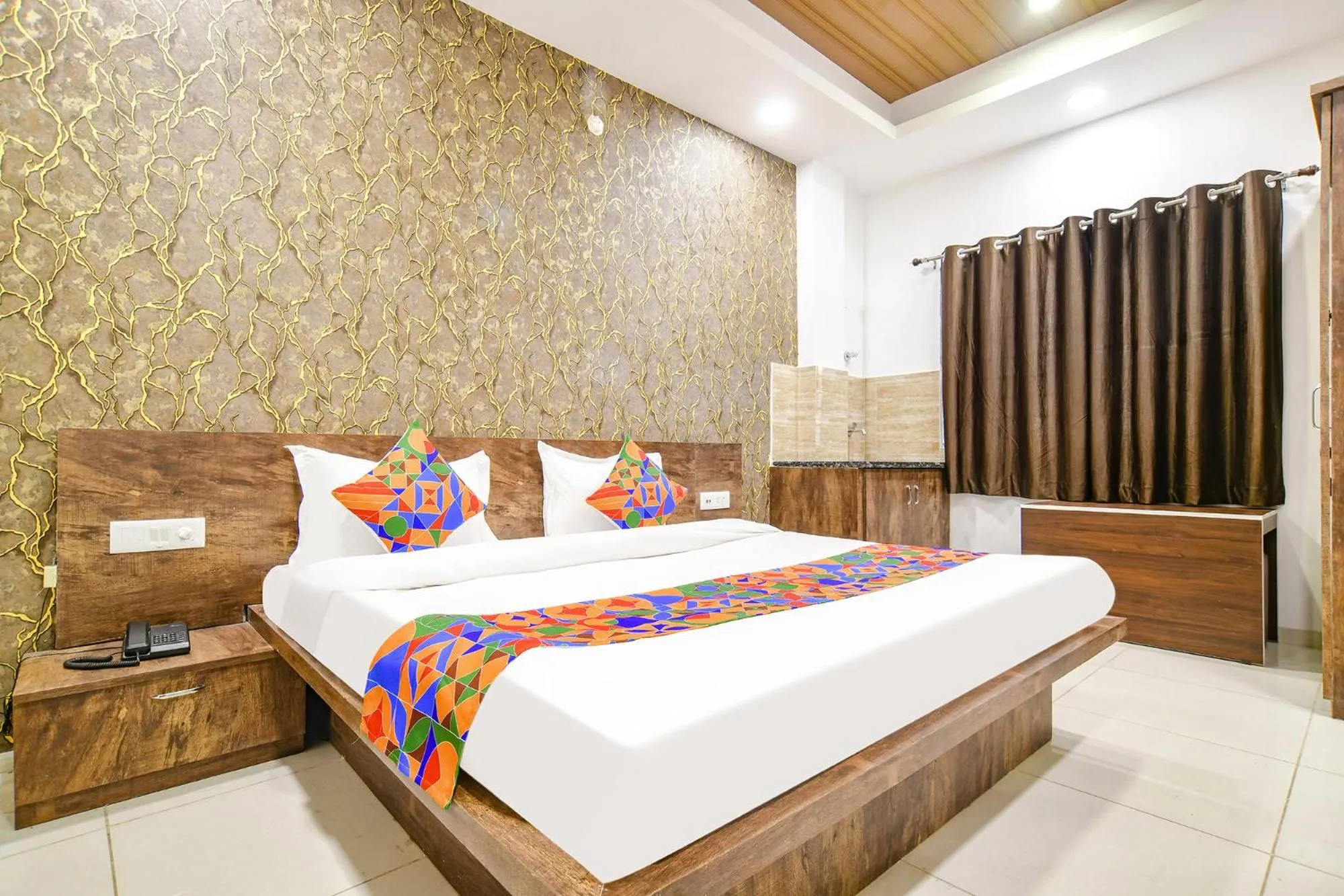 Bed in FabHotel Sage Residency