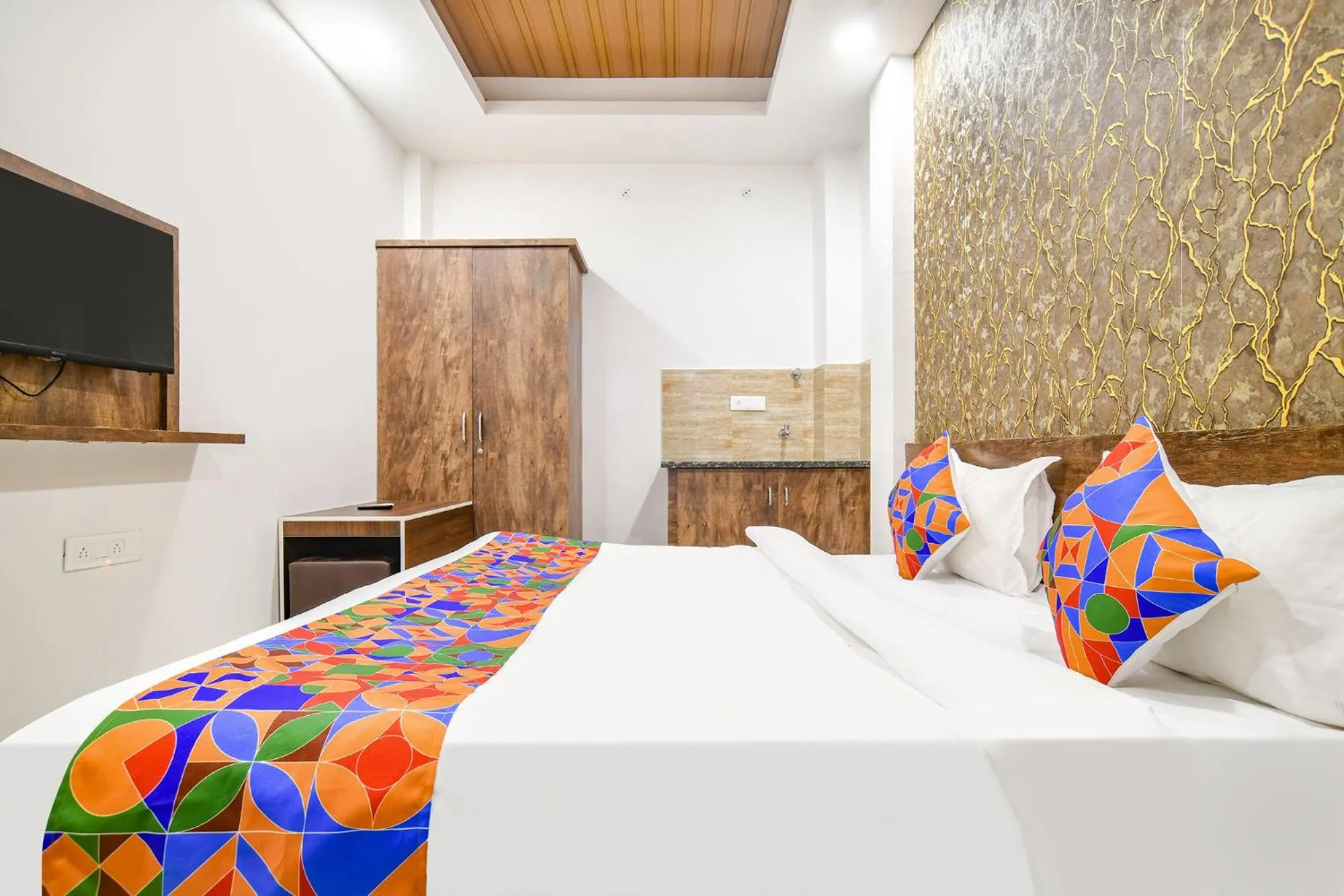 Bed in FabHotel Sage Residency