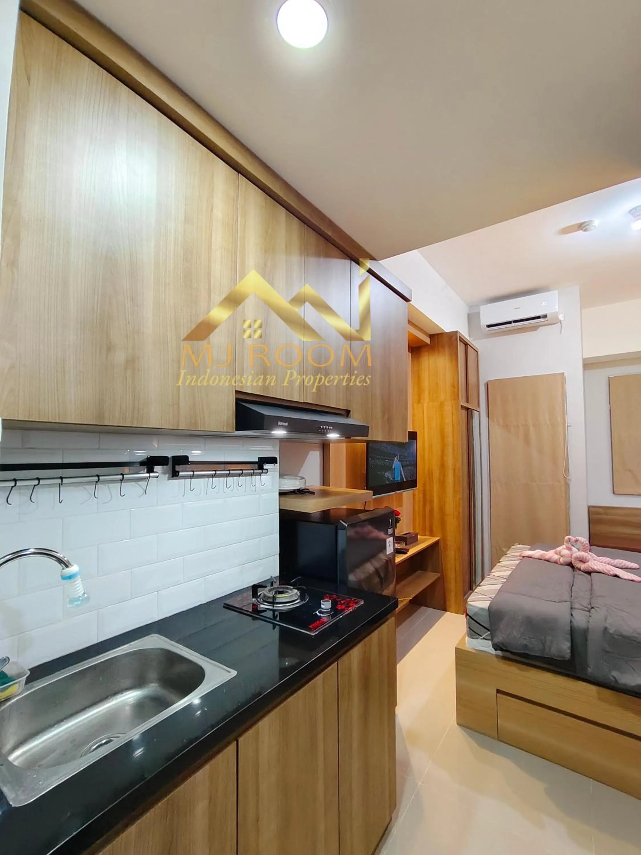 Kitchen or kitchenette in Trans Park Juanda Bekasi By MJ Room
