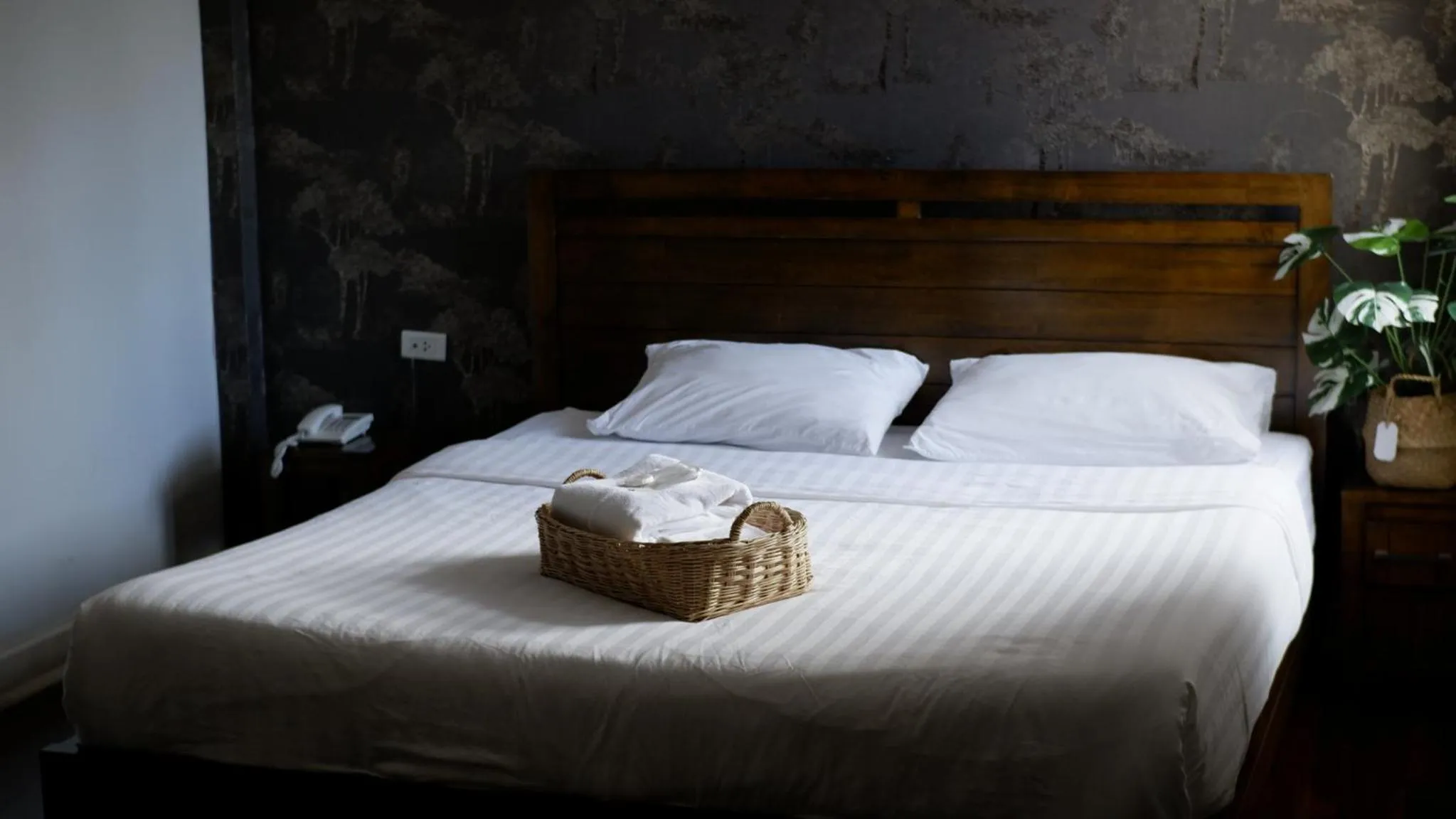 Bed in Delio Boutique Hotel