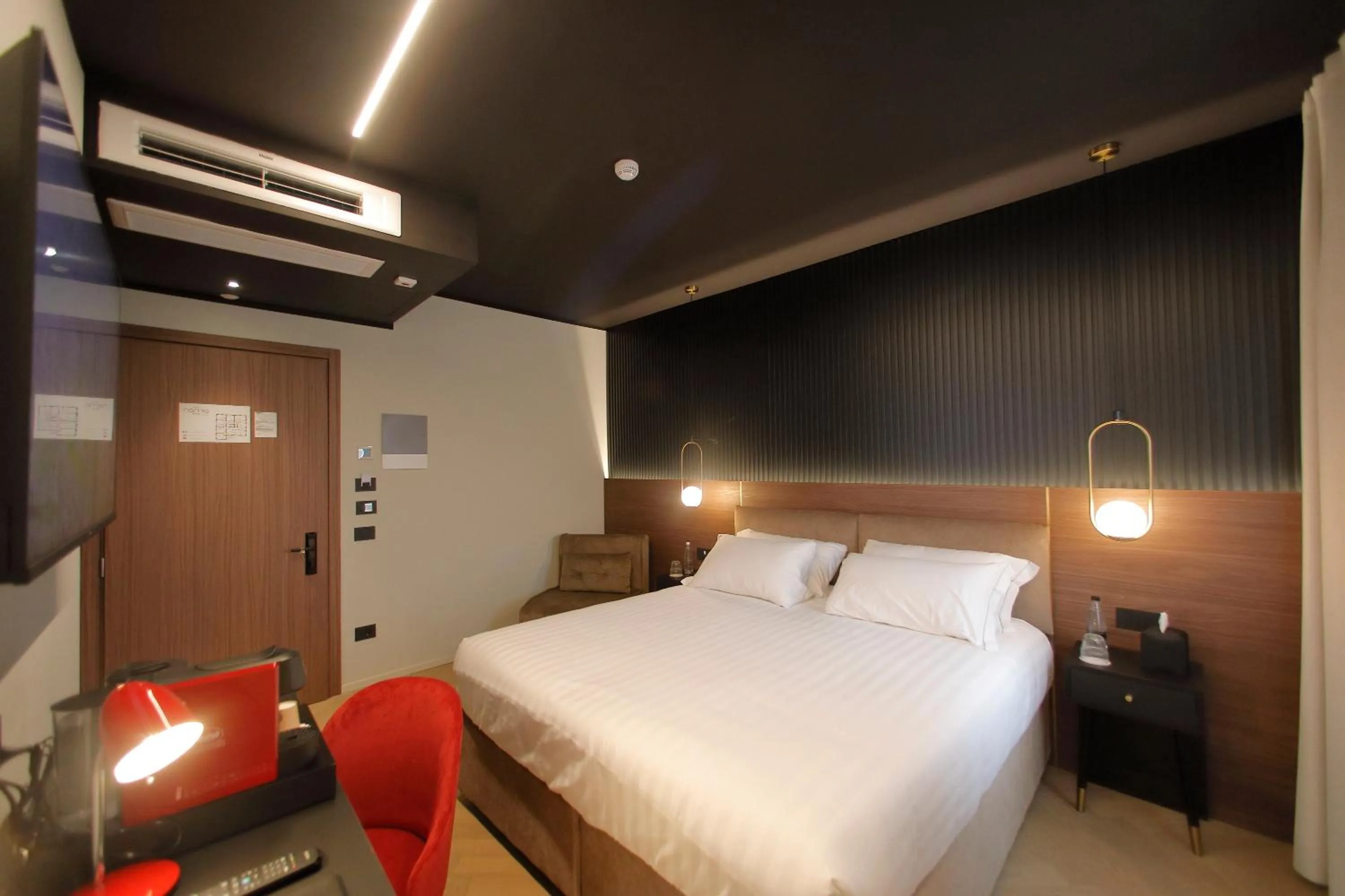 Bed in Hotel Namia by Dori