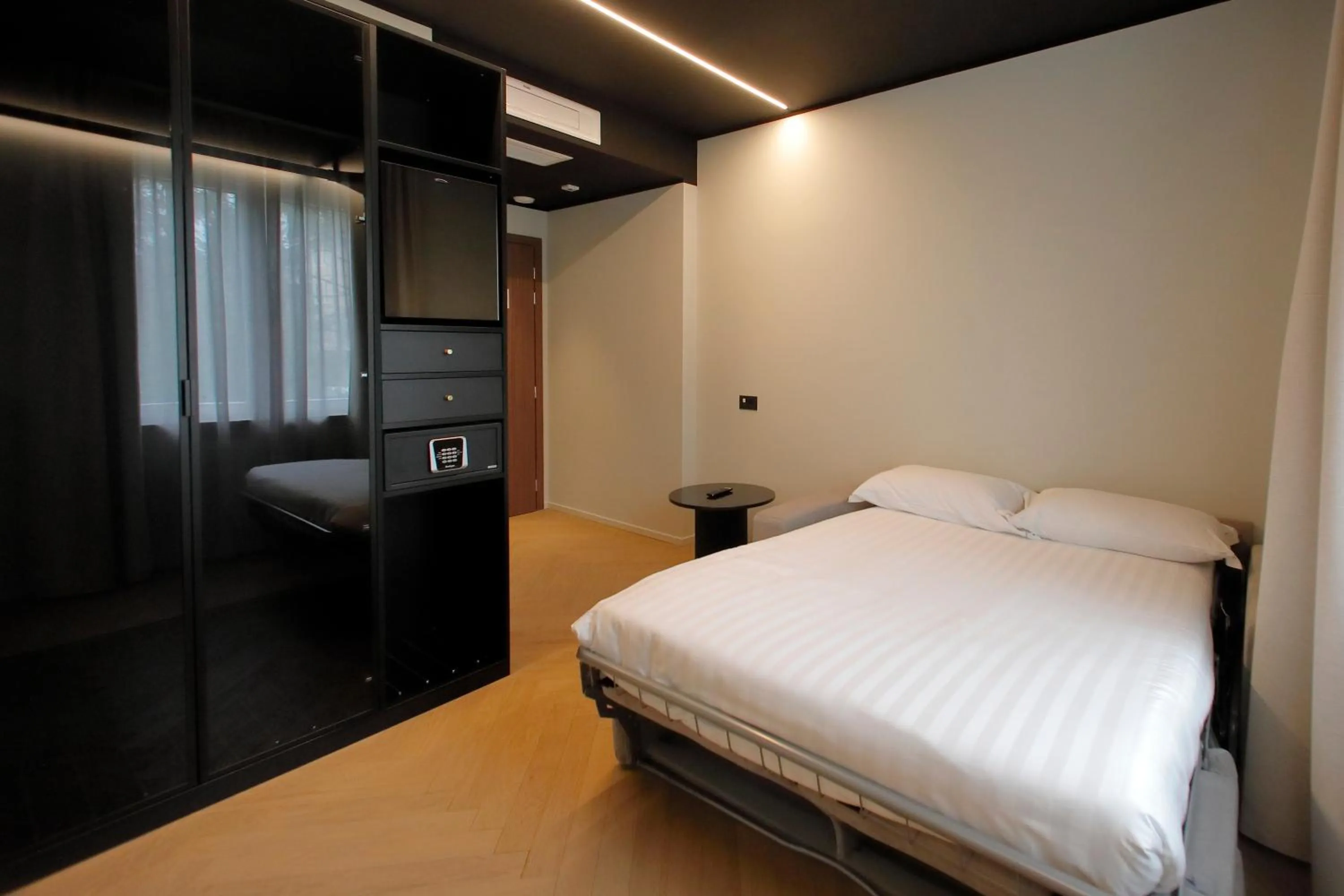 Bed in Hotel Namia by Dori