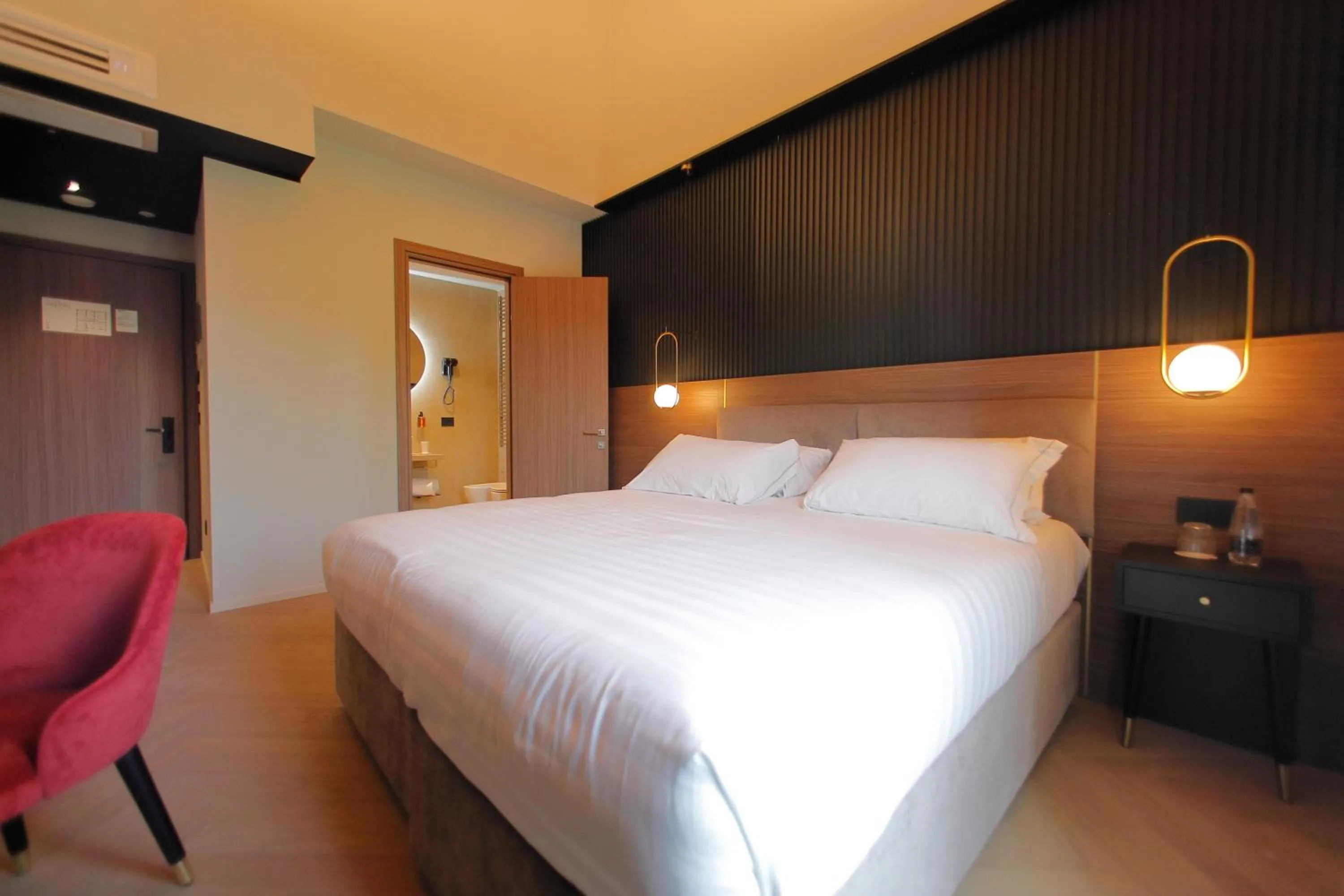 Bed in Hotel Namia by Dori