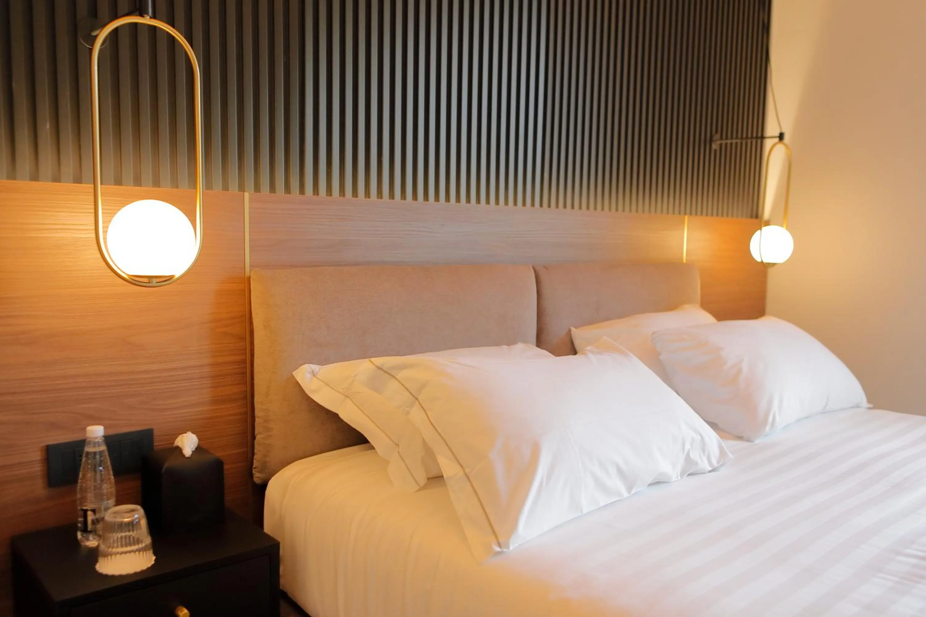 Bed in Hotel Namia by Dori