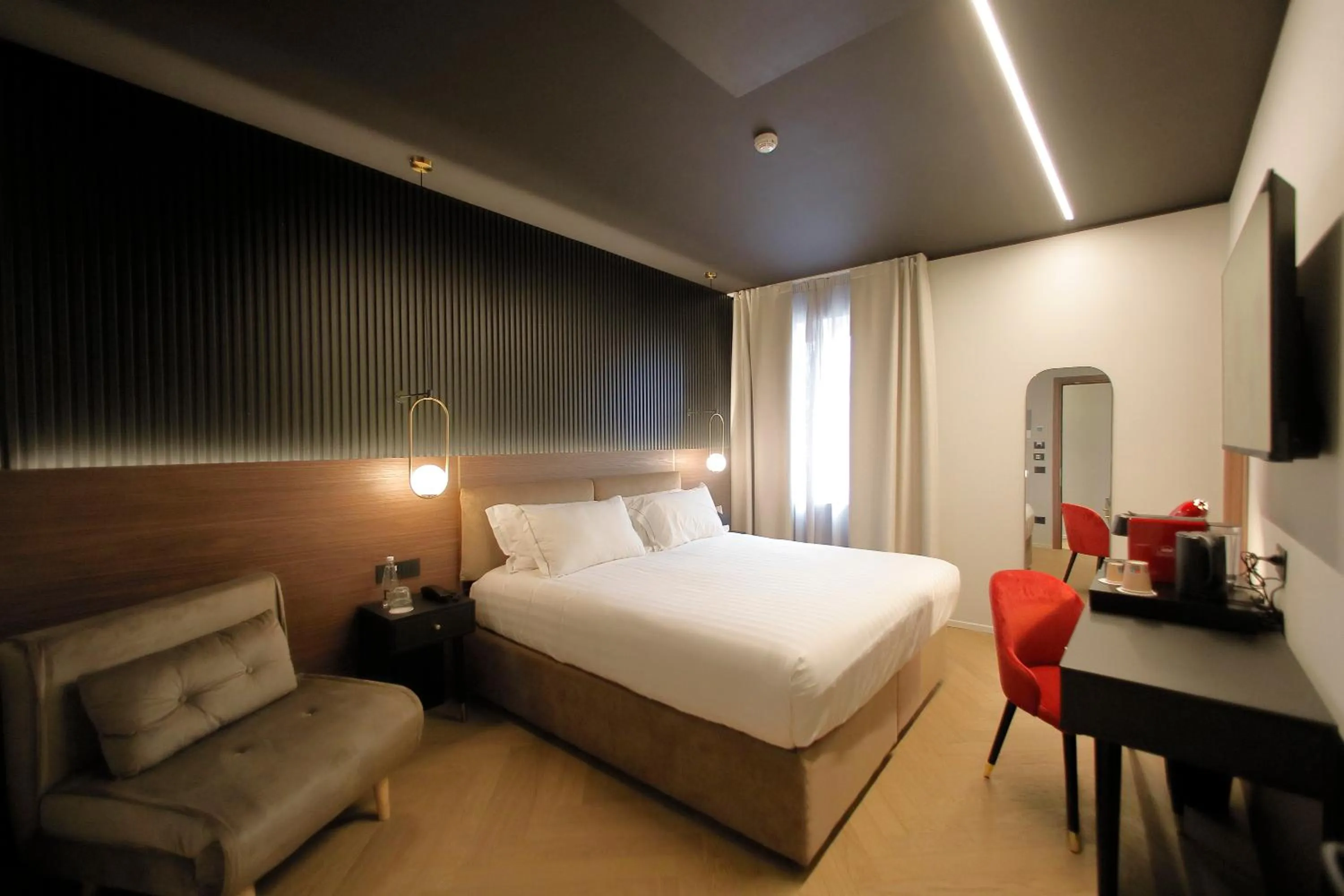 TV and multimedia, Bed in Hotel Namia by Dori