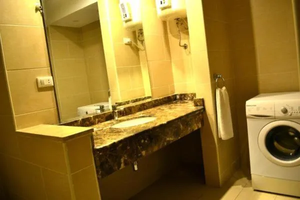 washing machine in Rivoli Suites and Spa