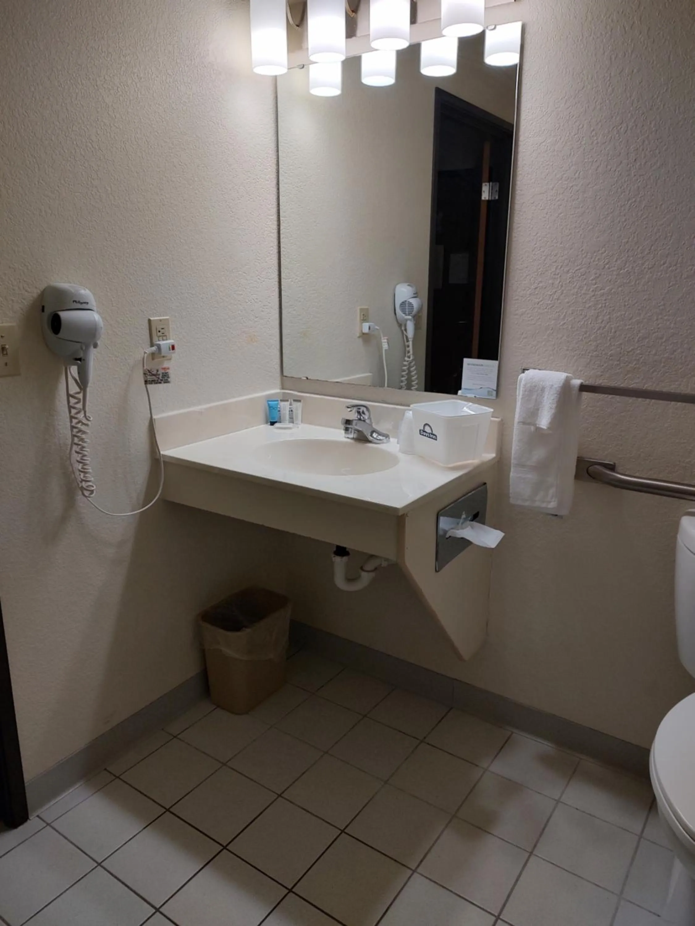 Bathroom in Days Inn & Suites by Wyndham Fargo 19th Ave/Airport Dome