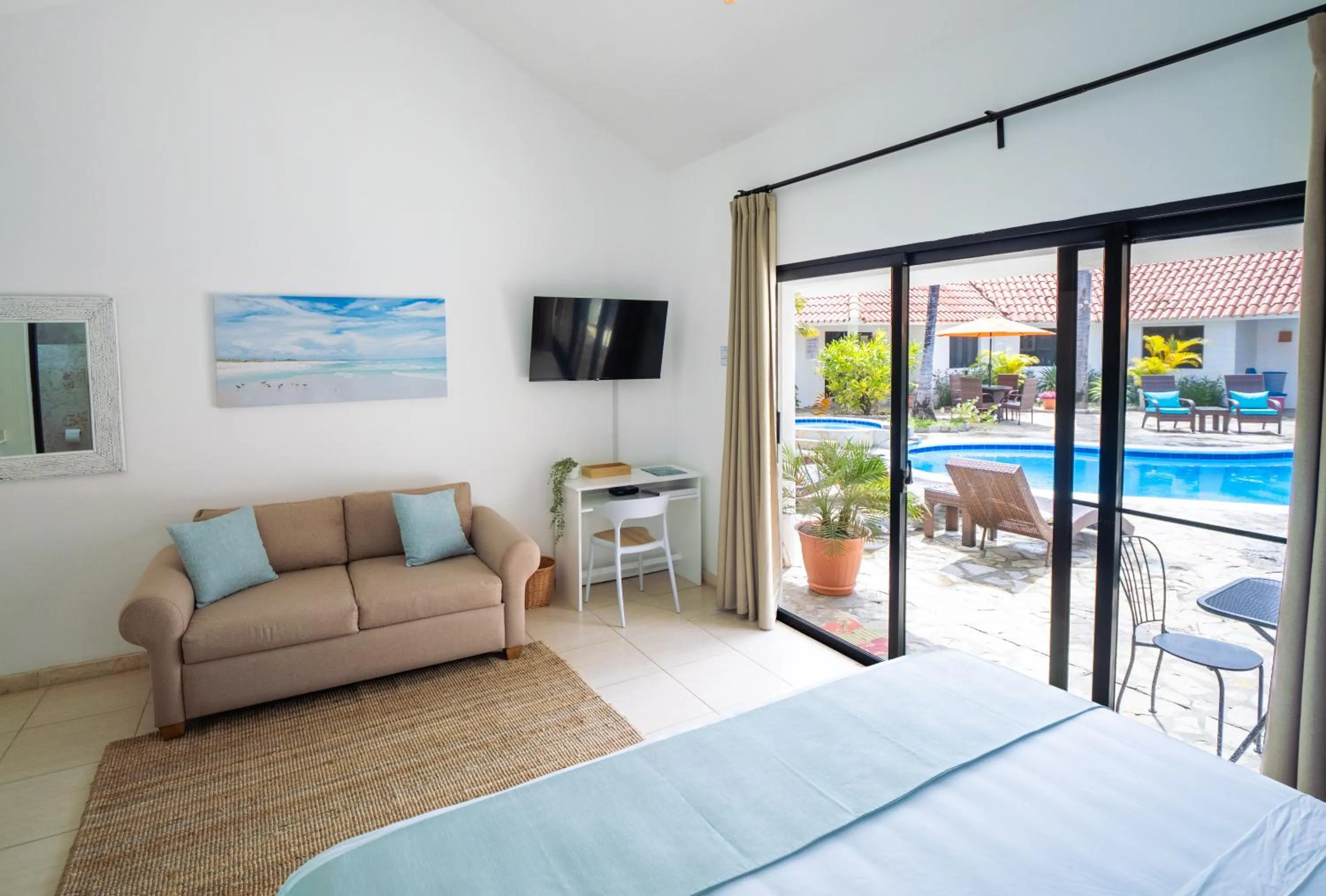 Pool view, Bed in Garden By The Sea