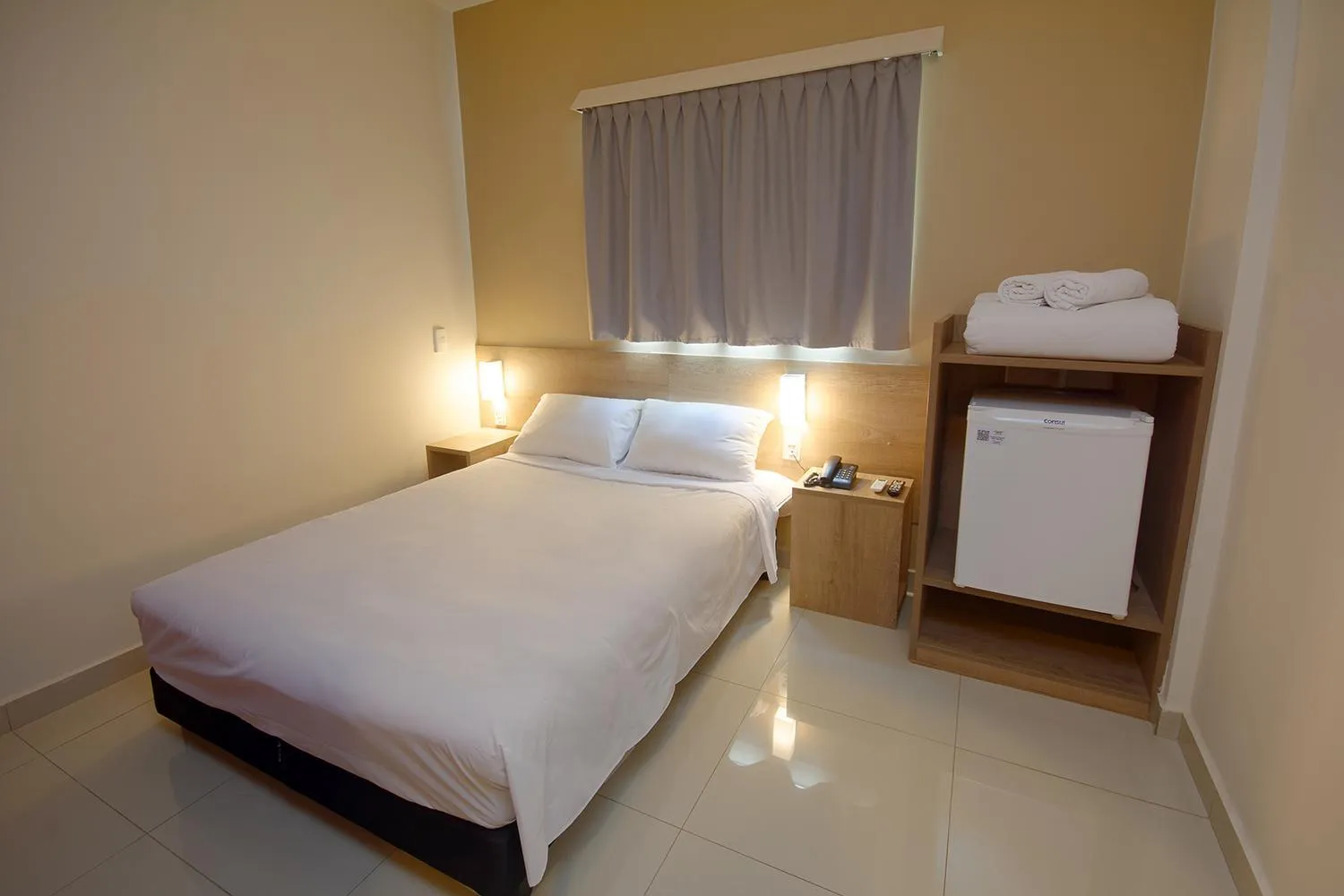 Photo of the whole room, Bed in Golden Tower Express Franca by Fênix Hotéis