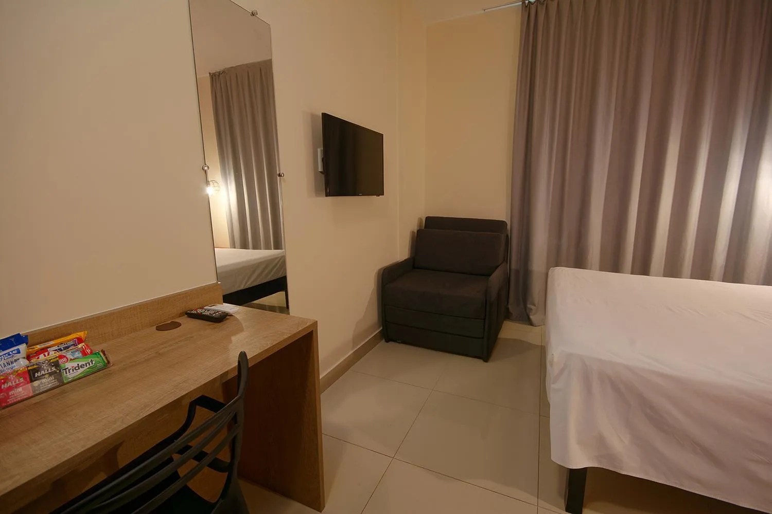 Bed in Golden Tower Express Franca by Fênix Hotéis