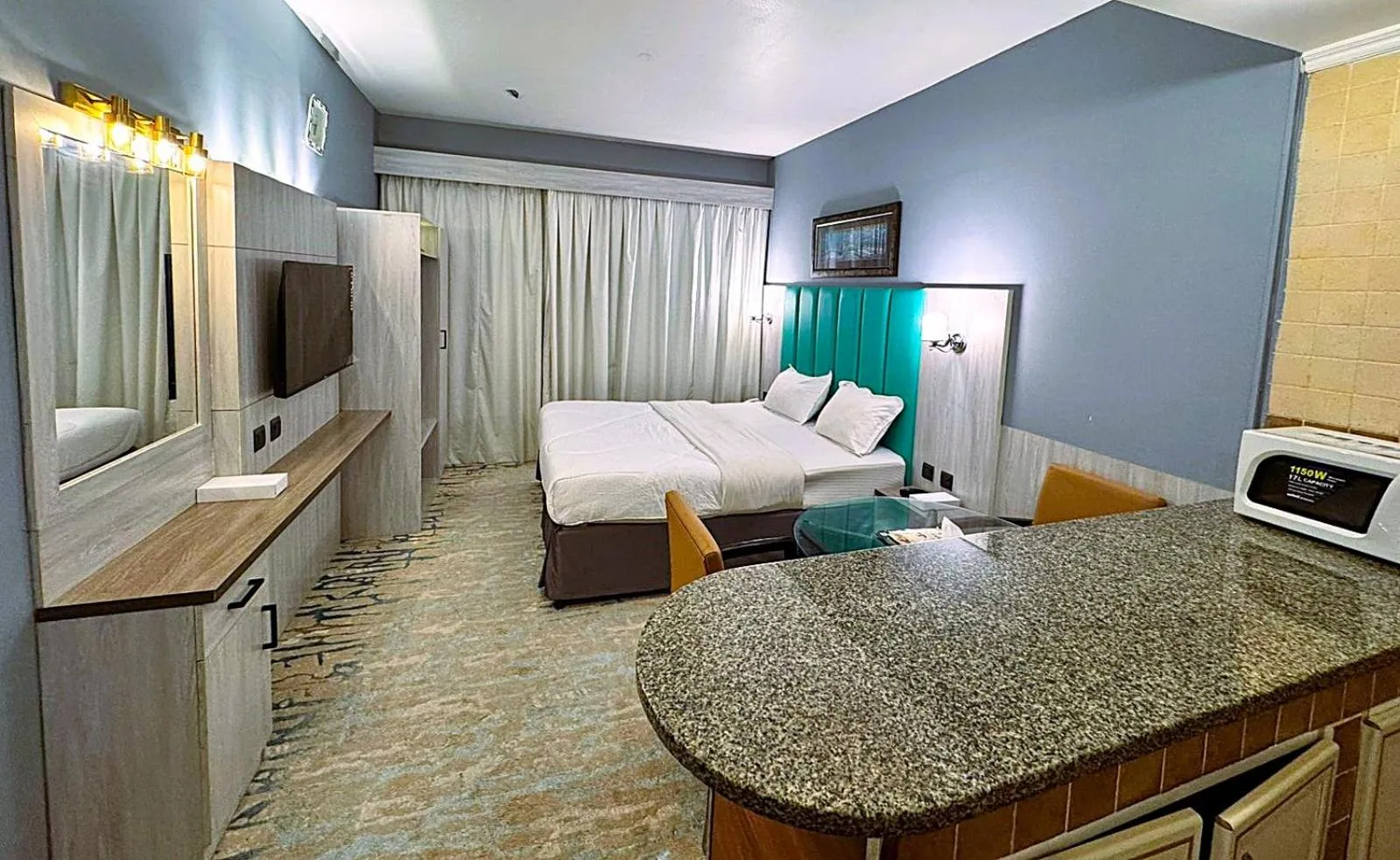Bed in Hafez Hotel Apartments - Al Ras Metro Station
