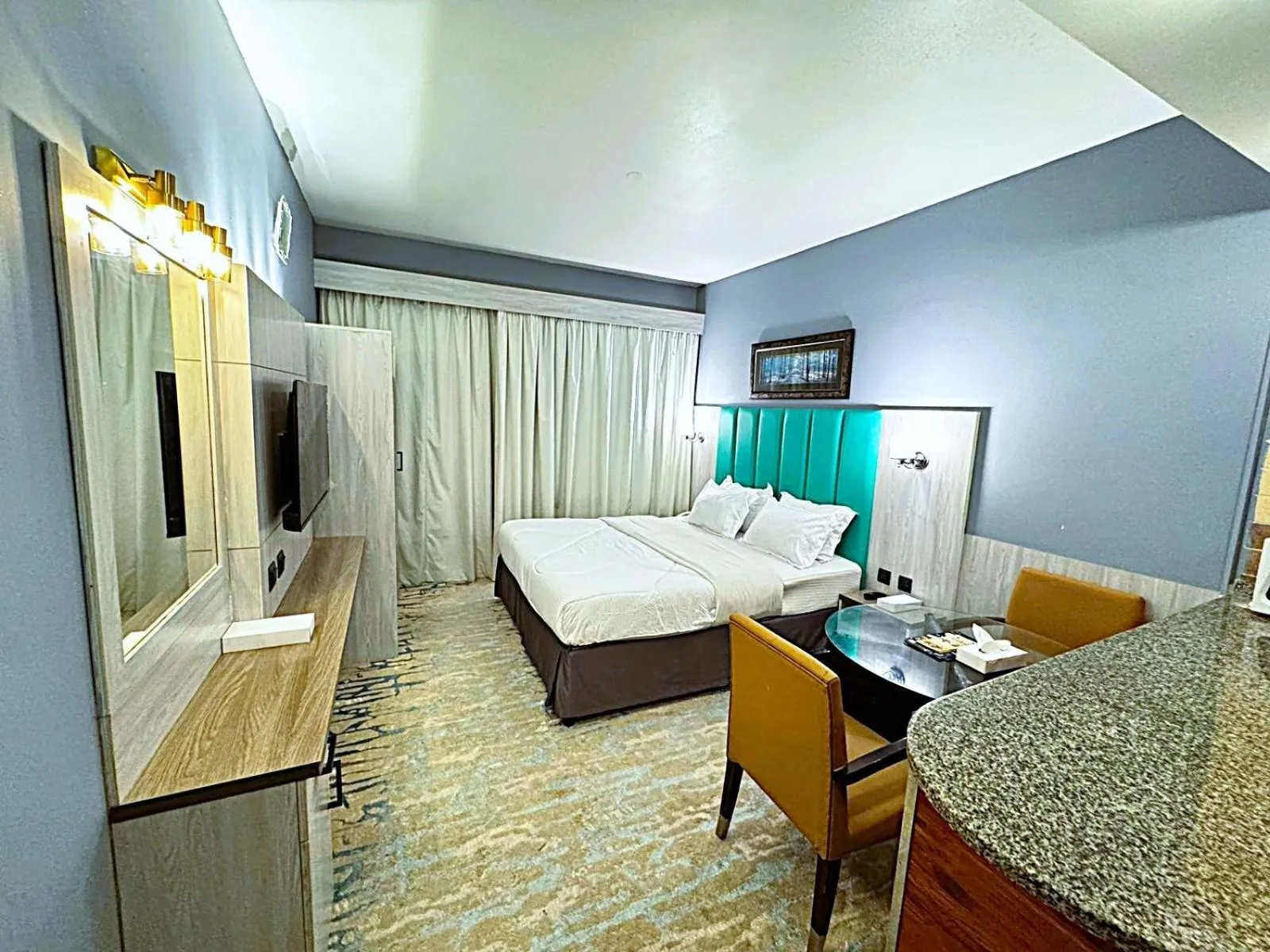 Photo of the whole room, Bed in Hafez Hotel Apartments - Al Ras Metro Station