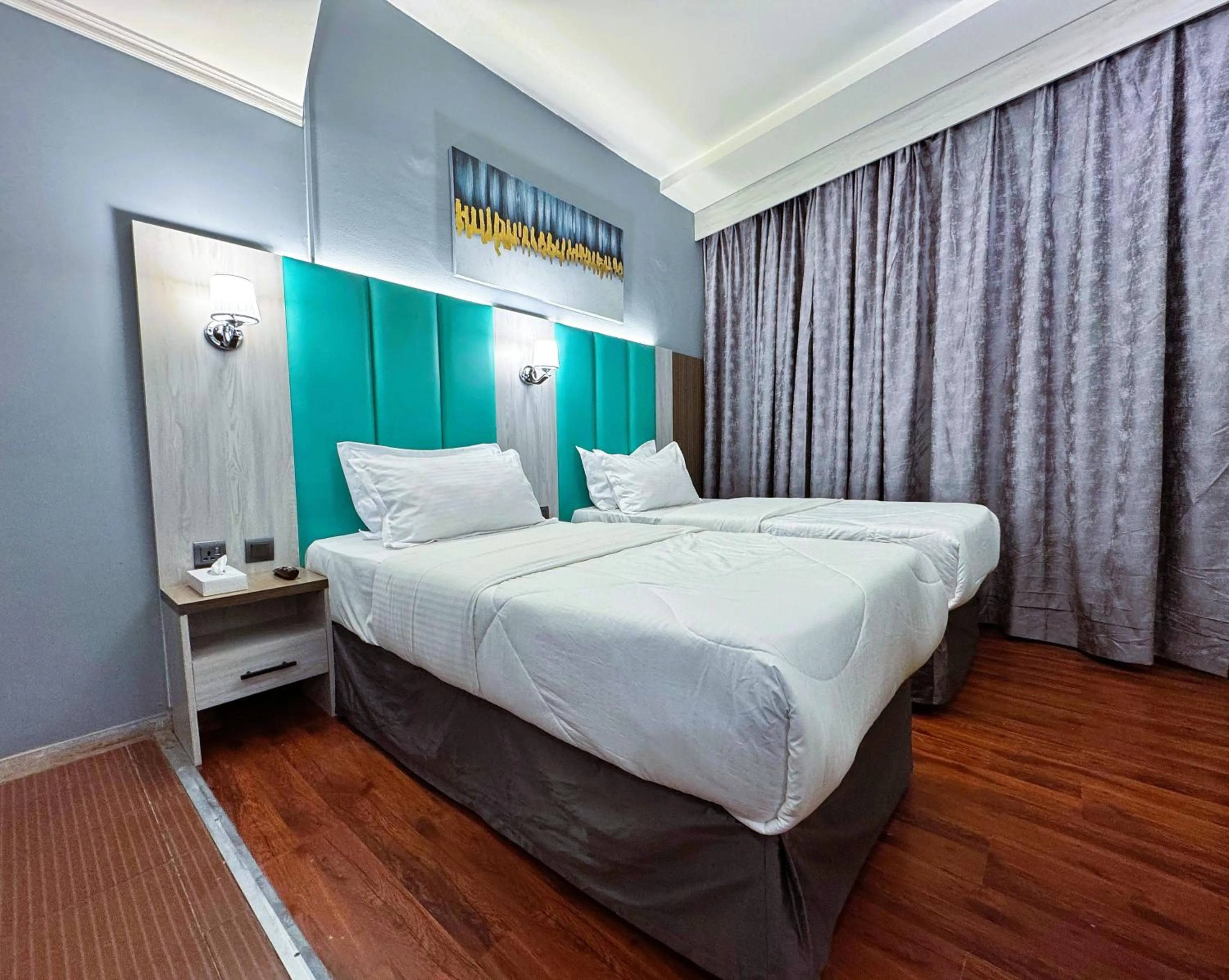 Bed in Hafez Hotel Apartments - Al Ras Metro Station